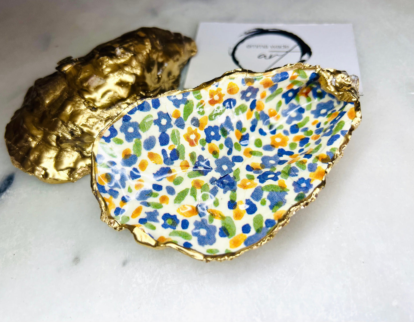 jewellery shell dish, gift for her, gift for mum, ring carrier dish, coastal decor, shell Decor, EmmaWadeART, Handmade Dorset oyster shell dish featuring Emma Bridgewater Yellow Blue Wildflower Meadow design. Finished with real gold leaf and resin. Use as a shell jewellery holder, ring dish, trinket tray, shell tray, salt pinch pot, tea light holder, or Christmas ornament. Sustainable coastal décor and unique handmade UK gift for weddings, anniversaries, or festive occasions.