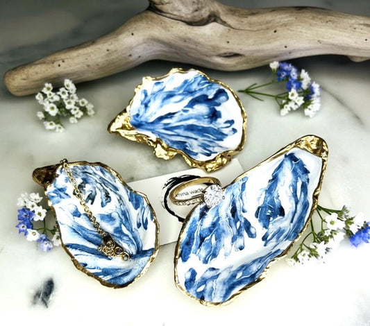 Trinket dishes gold finish, shell jewellery dish, navy and gold trinket tray, shell scallop dish, trinket tray shell, she dreams of the sea, shell jewellery bowl, golden trinket dish, oyster shell blue seaweed, blue and gold dishes, decoupaged earring dish, oyster dish with coral, shell art trinket, decoupage shell dish, Emma Wade art, bride oyster dish, oyster shell trinket, shell key bowl, shell coral dish