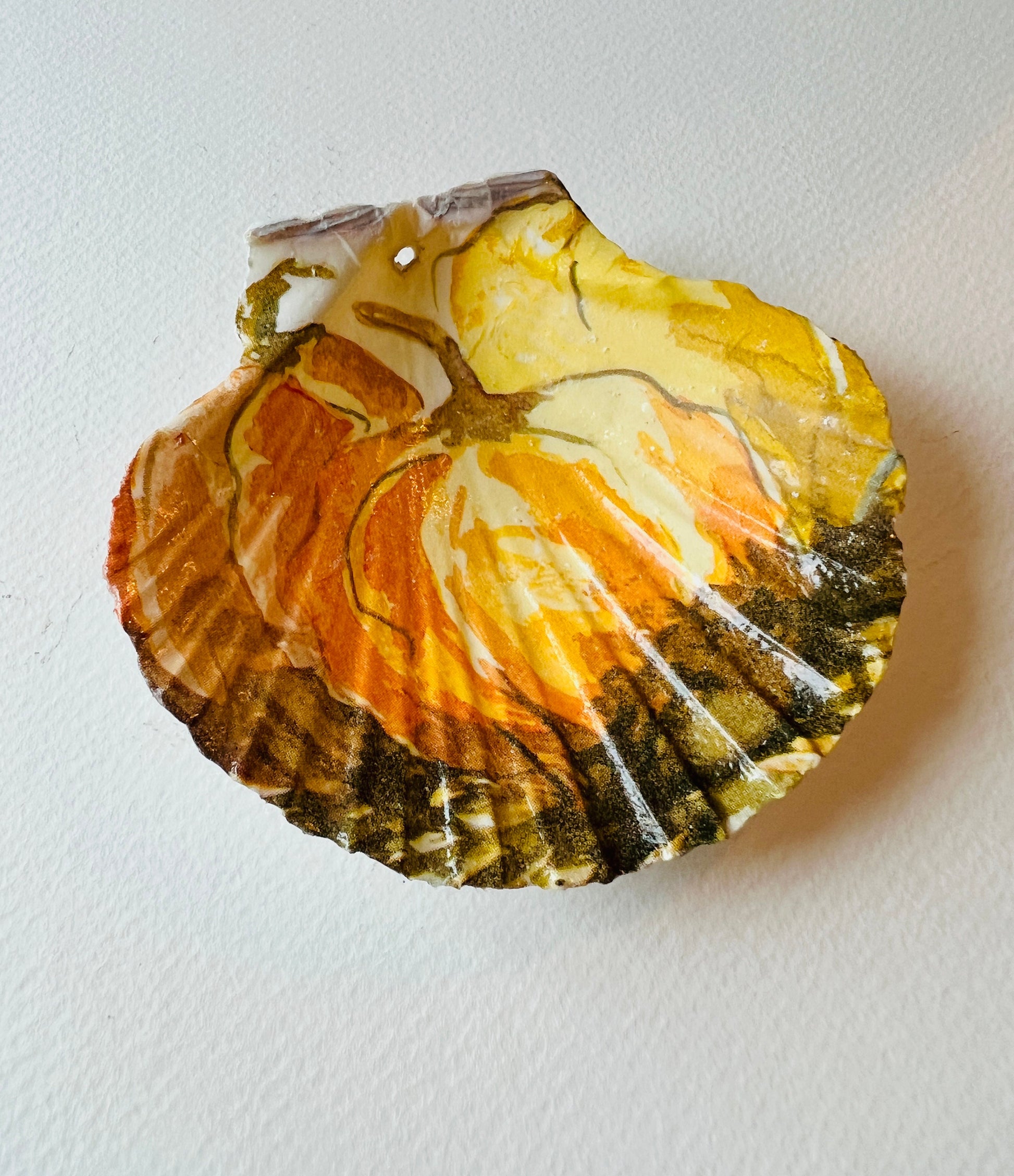 Pumpkin Halloween scallop shell ring dish, handmade Dorset scallop ring holder, jewellery trinket dish, autumn coastal décor, gothic pumpkin ornament, eco-friendly scallop shell bowl, gold leaf gilded shell, Halloween gift idea, seasonal table decoration, unique handmade scallop ornament, sustainable shell art, fall home accessory, spooky candy dish, rustic coastal pumpkin décor, artisan trinket holder, scallop shell jewellery storage, handmade ring dish and candy bowl.