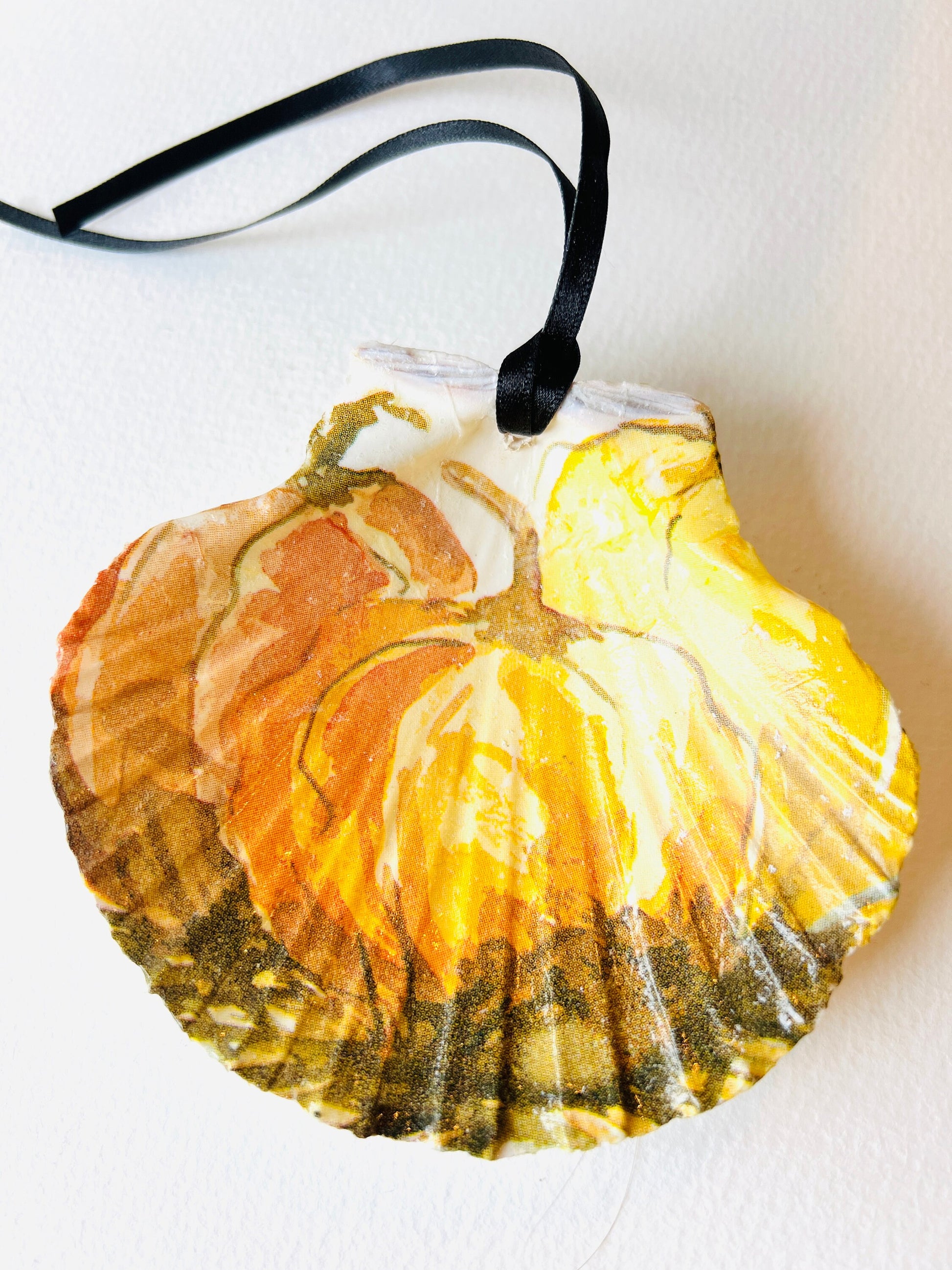 Pumpkin Halloween scallop shell ring dish, handmade Dorset scallop ring holder, jewellery trinket dish, autumn coastal décor, gothic pumpkin ornament, eco-friendly scallop shell bowl, gold leaf gilded shell, Halloween gift idea, seasonal table decoration, unique handmade scallop ornament, sustainable shell art, fall home accessory, spooky candy dish, rustic coastal pumpkin décor, artisan trinket holder, scallop shell jewellery storage, handmade ring dish and candy bowl.