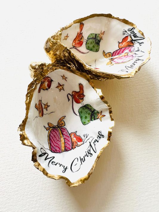 Robin bird oyster shell ornament, handmade in Dorset and gilded with liquid gold leaf. Unique coastal Christmas tree decoration or stocking filler. Can be used as a trinket dish, candy dish, or jewellery holder. Perfect bird lover gift, rustic festive ornament, eco-friendly holiday décor, oyster shell Christmas gift, handmade UK artisan bird decoration, coastal nature inspired home décor, robin bird keepsake.