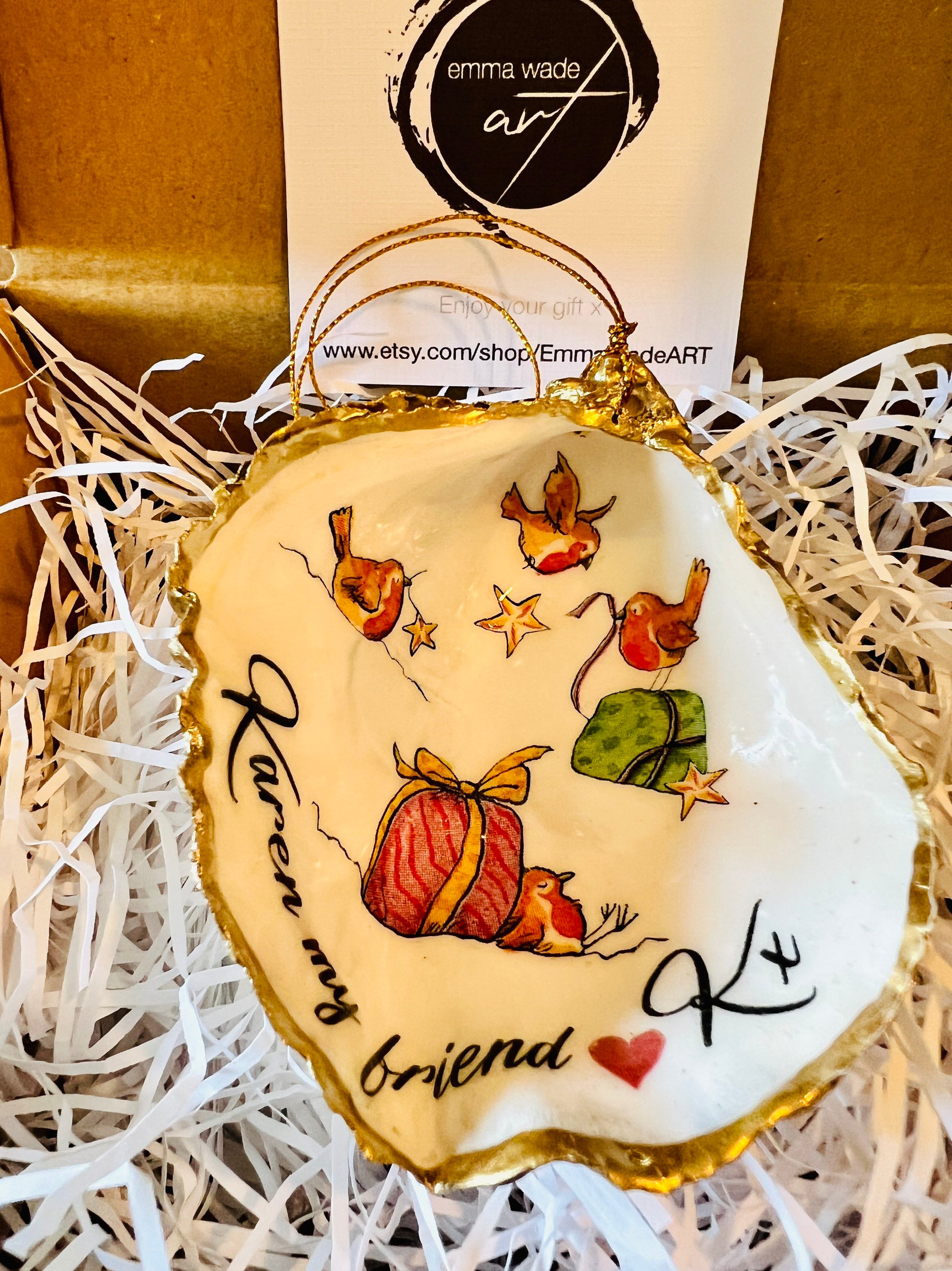 Robin bird oyster shell ornament, handmade in Dorset and gilded with liquid gold leaf. Unique coastal Christmas tree decoration or stocking filler. Can be used as a trinket dish, candy dish, or jewellery holder. Perfect bird lover gift, rustic festive ornament, eco-friendly holiday décor, oyster shell Christmas gift, handmade UK artisan bird decoration, coastal nature inspired home décor, robin bird keepsake.