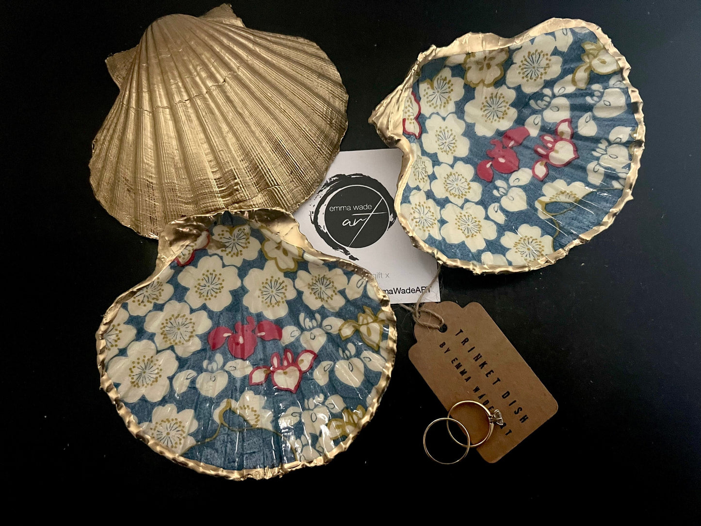 Japanese Sakura cherry blossom floral scallop shell trinket dish with blue, cream and red botanical flower design, hand finished with liquid gold leaf edging and glossy resin. Handmade coastal jewellery tray and ring dish inspired by Japanese floral art and Dorset coastal décor.
