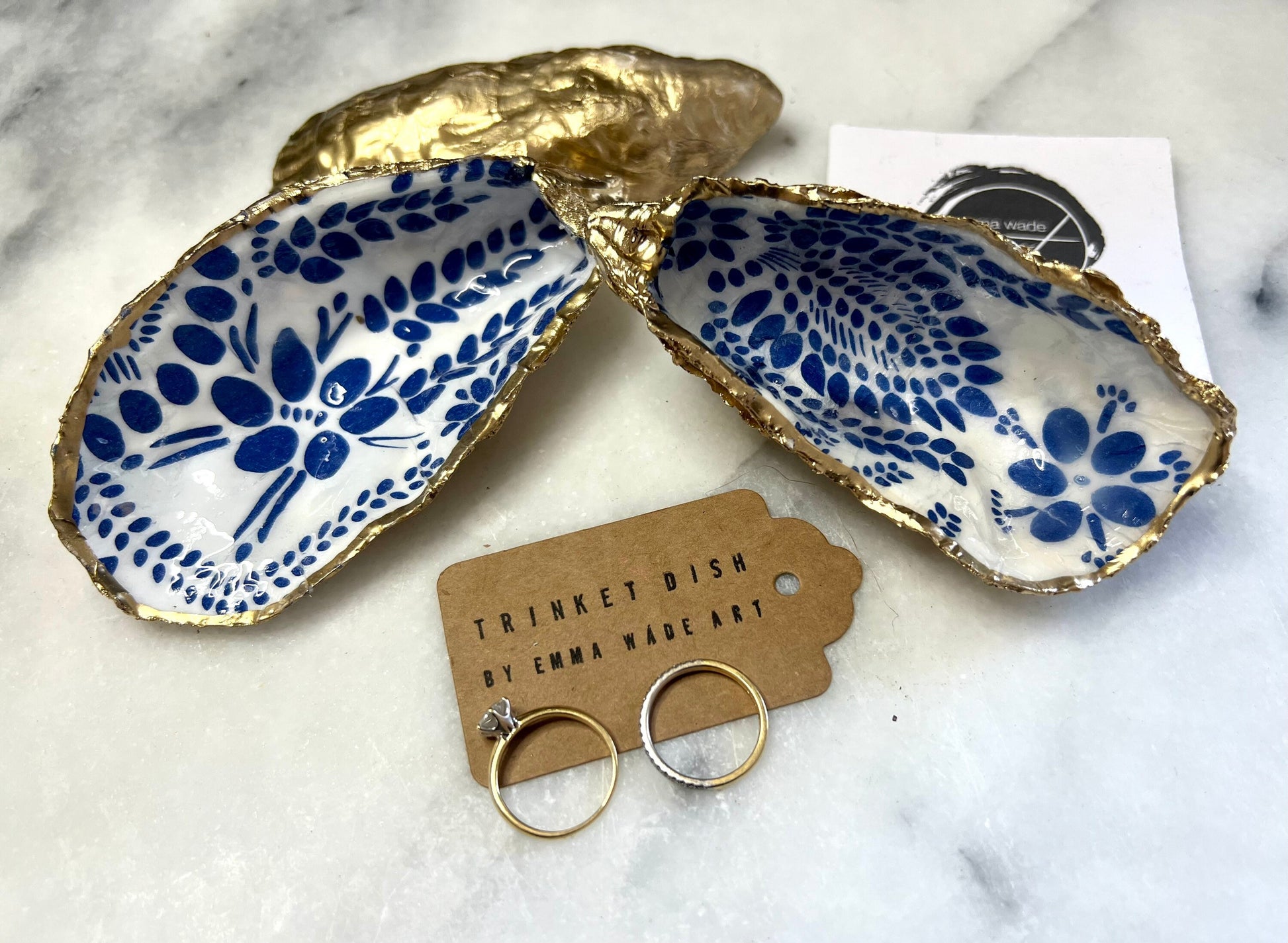 Gift for her, Gift for him, Marimekko gift, decoupaged scallop shell, Ring holder, Shell Jewellery box, Trinket dish, jewellery shell dish, Anniversary gift, gift for mum, anniversary gift, Uk Coastal shell decor, Coastal ornament, EmmaWadeART, Handmade Dorset oyster shell dish decorated with a Marimekko-inspired Finnish blue floral botanical design. Each shell is hand-finished with liquid gold leaf on the rim and back, then sealed in crystal-clear resin for a glossy, durable finish.