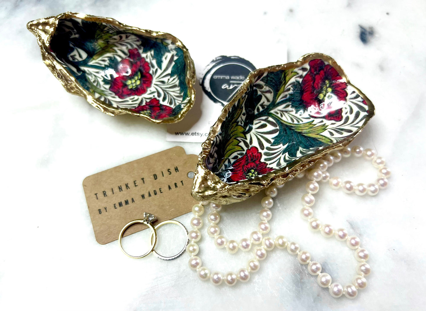 William Morris Red Peony oyster shell ring dish and jewellery dish. Handmade from natural Dorset shells with hand-painted floral design and gold leaf edges. A unique trinket tray, ring holder, or cufflink dish. Perfect for weddings, anniversaries, birthdays, bridesmaids, or new home gifts. Can also be used as a tealight holder, spoon rest, or salt pinch pot. Presented in a sustainable gift box. A beautiful handmade coastal ornament and keepsake for someone special.