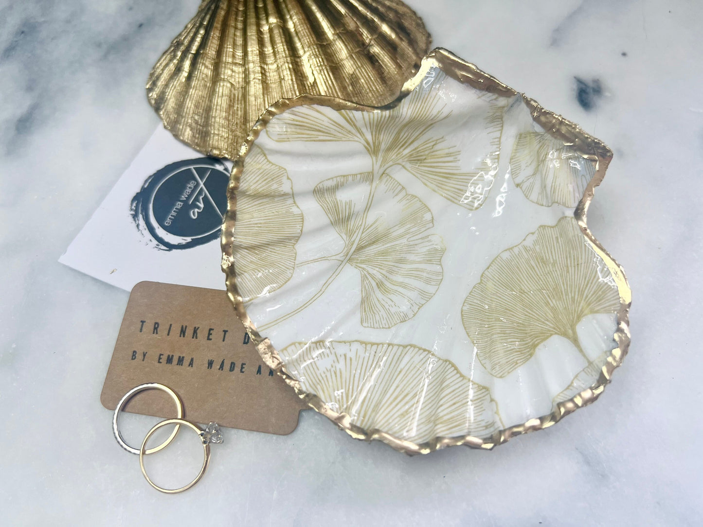 Scallop Hell Dish hand crafted with gold and white Gingko Designs, shellfish jewellery dish, UK Natural Scallop trinket tray, shell scallop dish, trinket tray shell, scallop shell jewellery bowl, golden trinket dish, decoupaged earring dish, scallop dish with gingko, decoupage shell dish, Emma Wade art, bride scallop dish, scallop shell trinket bowl, shell key bowl, gold gilded shell gift, coastal shell gift, gold white host gift, gold shell ornament, decoupage shell ring dish