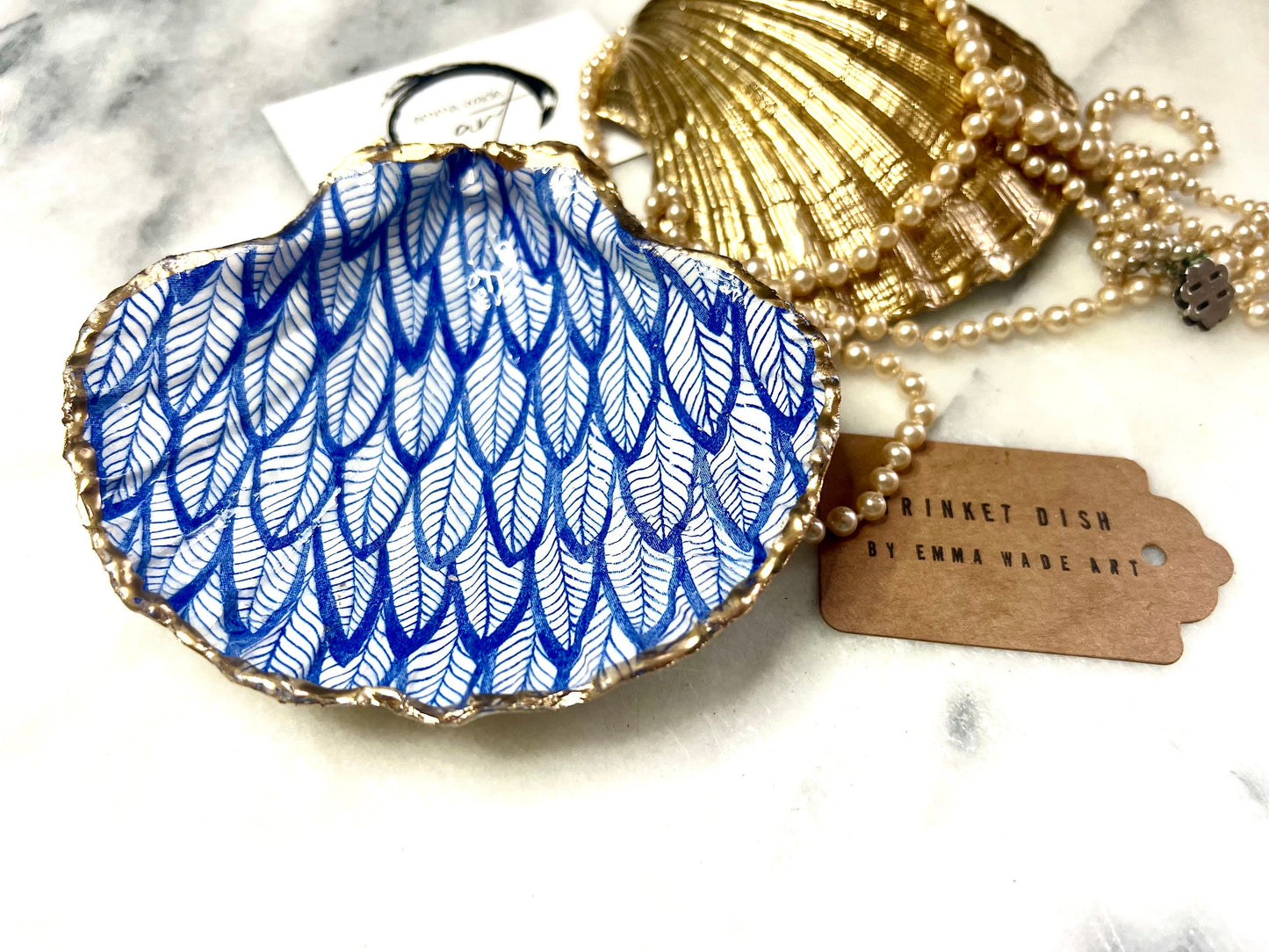 Blue Feathers Shell Gift, Trinket scallop Shell dish gold finish, gold leaf trinket tray, shell scallop dish, Blue Nature lover shell bowl, decorative scallop shells, Blue White Feather Design key bowl, blue and gold shell dish, Blue ring dish, golden trinket dish, bride shell dish, shell jewellery bowl, decoupaged earrings dish, shell art trinket, Blue shell gift, Gold shell trinket holder, painted shell with gold, shell jewellery dish, Emma Wade art, Proposal Ring Tray, Blue Painted Key Bowl,