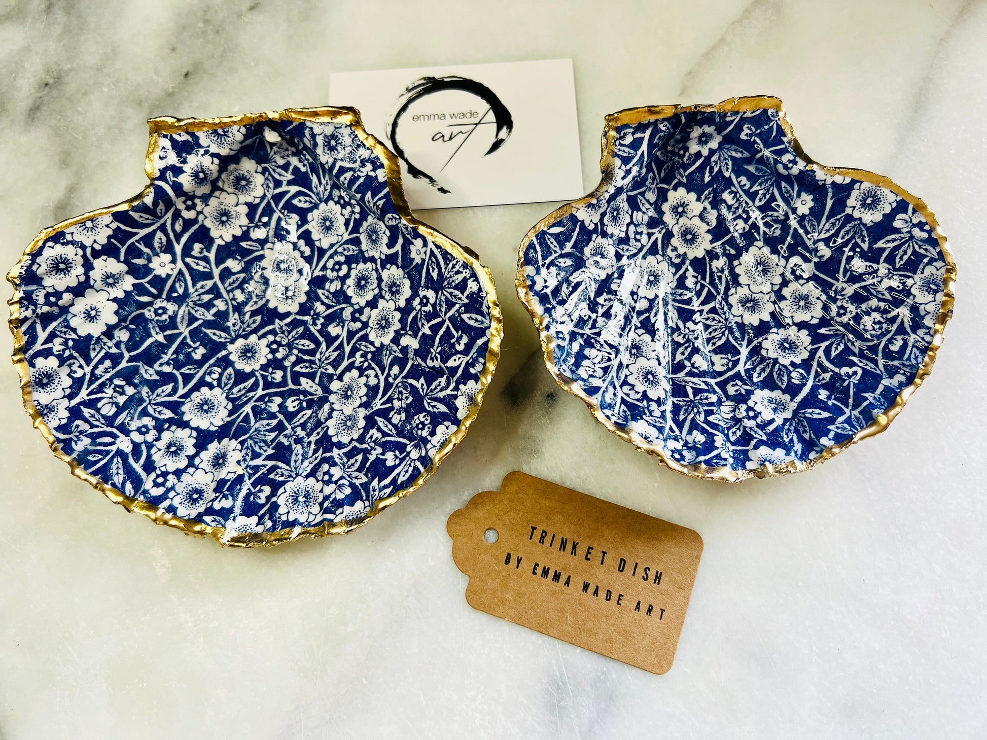 blue and white floral scallop shell dish, Dorset handmade oyster shell jewellery holder, gold leaf scallop shell trinket dish, coastal ring holder dish, sustainable scallop shell ornament, artisan jewellery dish UK, scallop shell salt and pepper pinch pot, floral scallop shell vanity tray, handmade scallop shell gift for her, blue and white coastal home decor dish, unique Dorset scallop shell trinket storage, hand gilded scallop shell decorative dish, UK handmade artisan shell gift