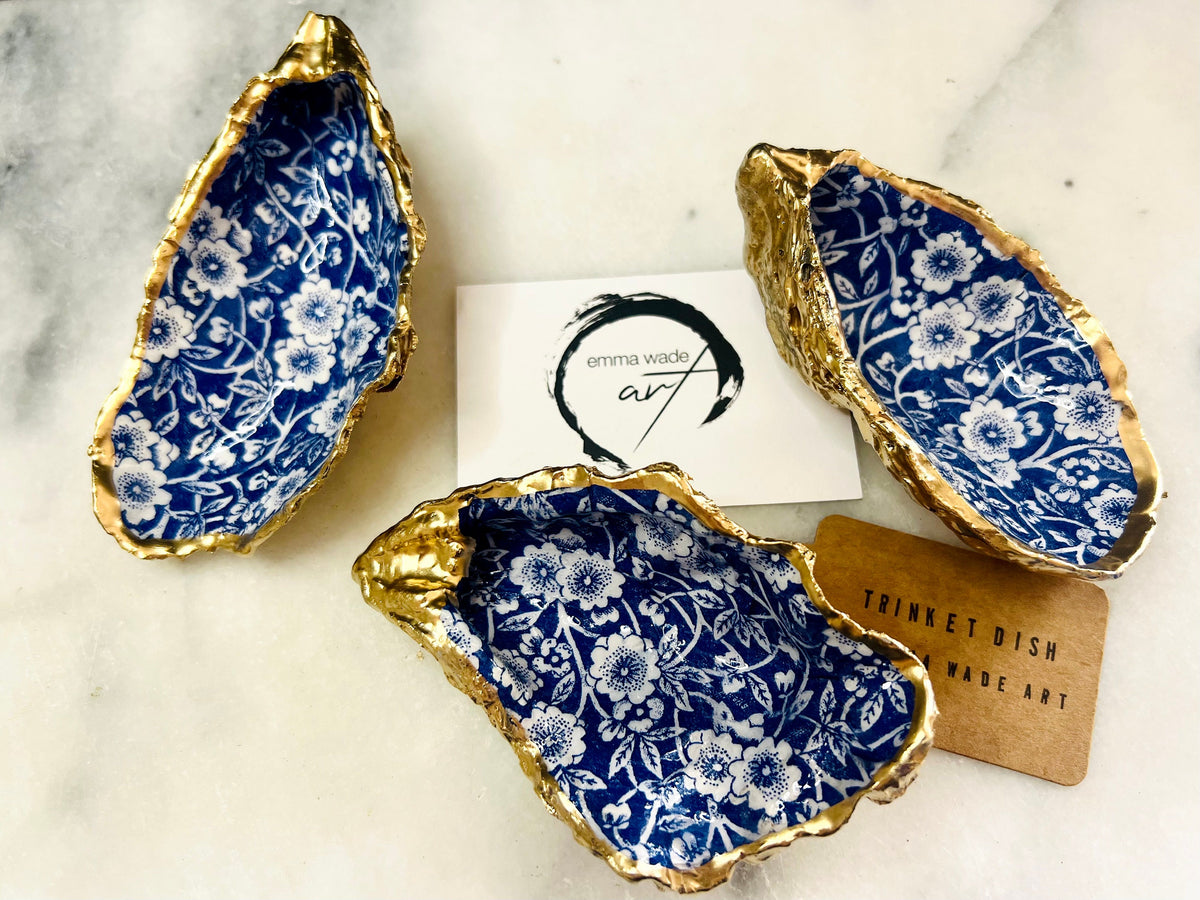 navy blue and white floral oyster shell dish, Dorset oyster shell jewellery holder, handmade coastal trinket dish UK, gold leaf gilded oyster shell ornament, eco friendly oyster shell vanity tray, unique handmade oyster shell cufflink or tie pin dish, navy floral oyster shell salt and pepper pinch pot, oyster shell spoon rest or sugar dish, floral oyster shell coastal bathroom accessory, sustainable Dorset oyster shell art, handmade oyster shell wedding or anniversary gift UK