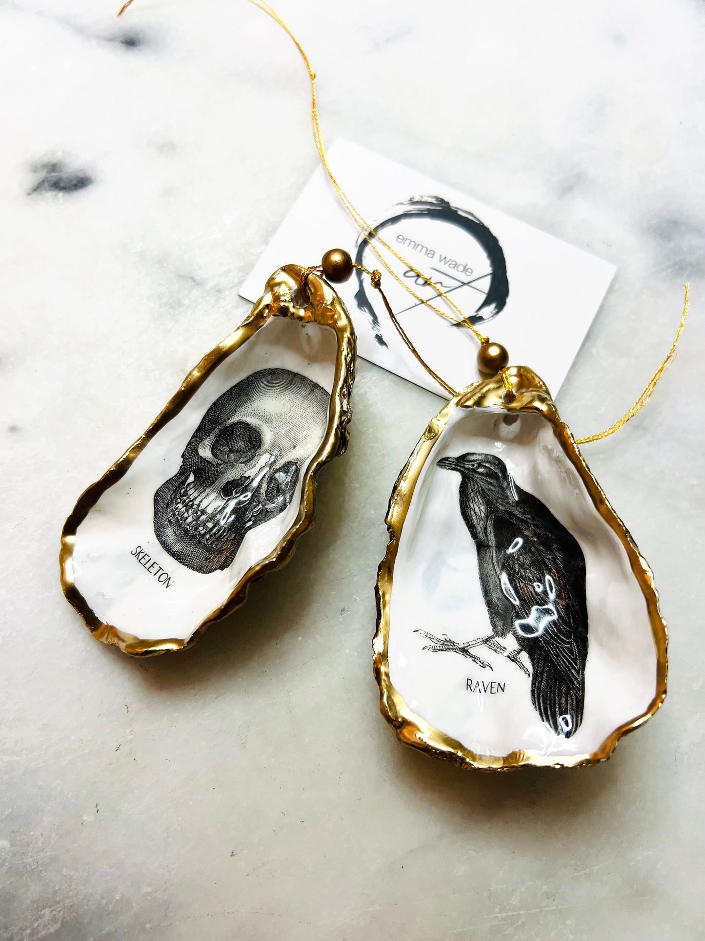 gothic ornaments, halloween oyster shell, gilded oyster hanging ornaments, coastal gothic decor, gothic christmas ornament, skull oyster shell decoration, pumpkin oyster shell ornament, raven oyster shell hanging decor, spooky oyster shell trinket dish, gothic halloween tree ornament, handmade gothic oyster shell gift, oyster shell gothic home accessory, dark gothic oyster shell decor, halloween oyster shell candy dish, gothic oyster shell jewellery holder, handmade oyster art UK