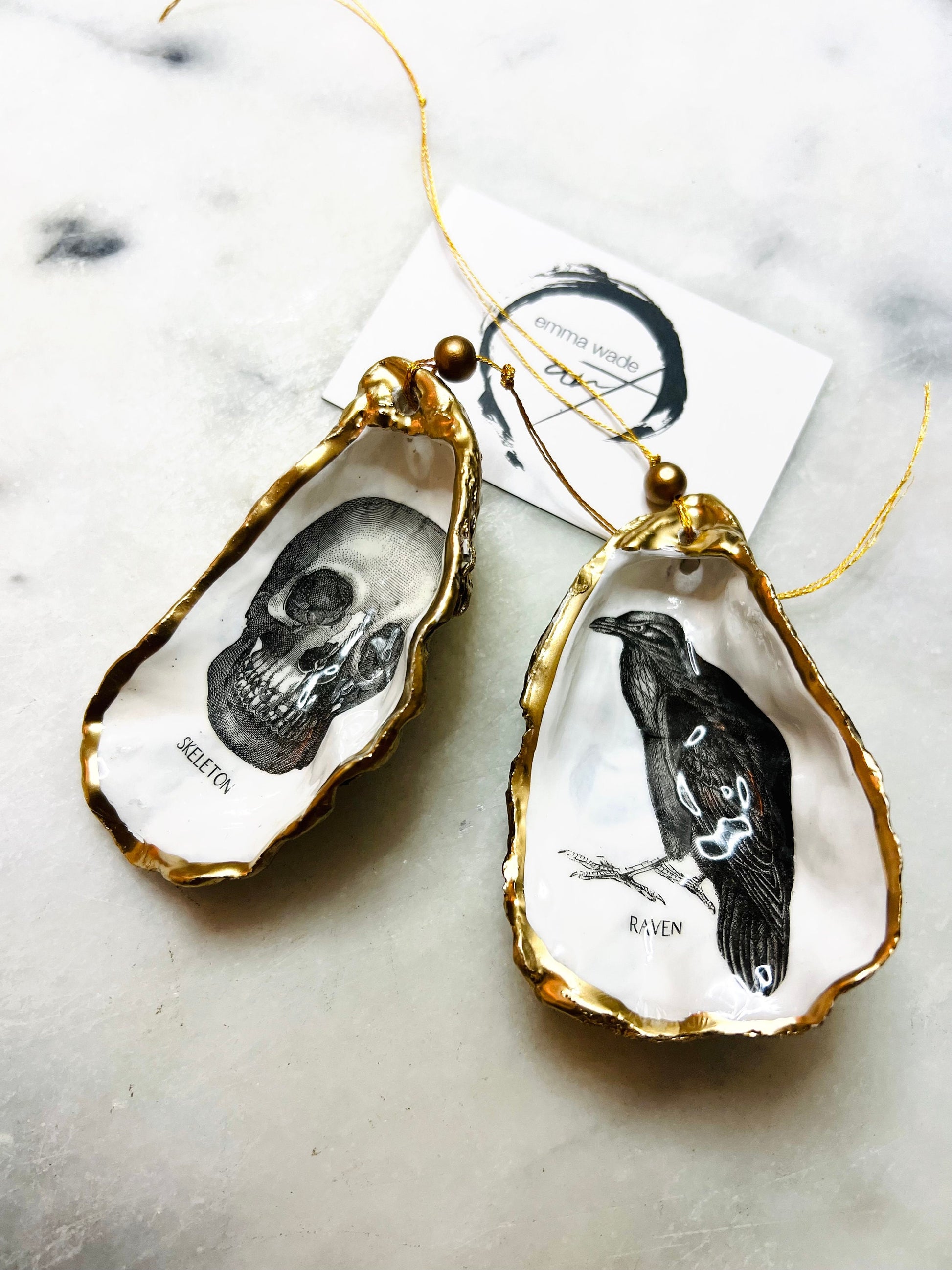gothic ornaments, halloween oyster shell, gilded oyster hanging ornaments, coastal gothic decor, gothic christmas ornament, skull oyster shell decoration, pumpkin oyster shell ornament, raven oyster shell hanging decor, spooky oyster shell trinket dish, gothic halloween tree ornament, handmade gothic oyster shell gift, oyster shell gothic home accessory, dark gothic oyster shell decor, halloween oyster shell candy dish, gothic oyster shell jewellery holder, handmade oyster art UK