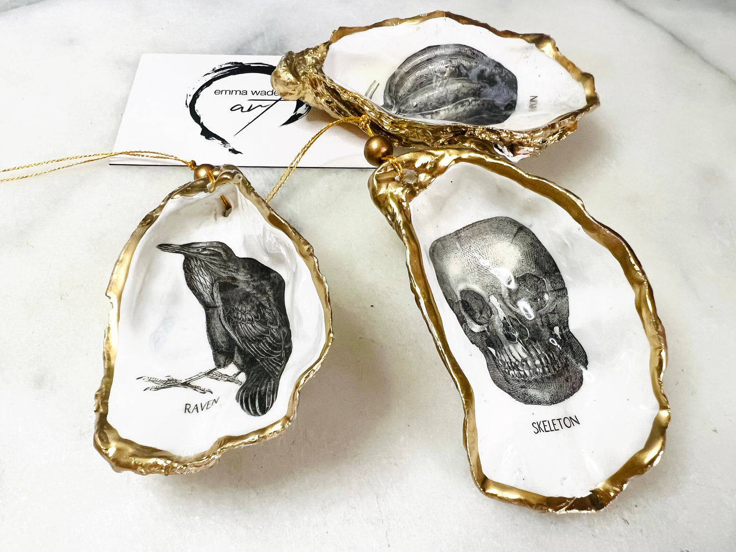 gothic ornaments, halloween oyster shell, gilded oyster hanging ornaments, coastal gothic decor, gothic christmas ornament, skull oyster shell decoration, pumpkin oyster shell ornament, raven oyster shell hanging decor, spooky oyster shell trinket dish, gothic halloween tree ornament, handmade gothic oyster shell gift, oyster shell gothic home accessory, dark gothic oyster shell decor, halloween oyster shell candy dish, gothic oyster shell jewellery holder, handmade oyster art UK