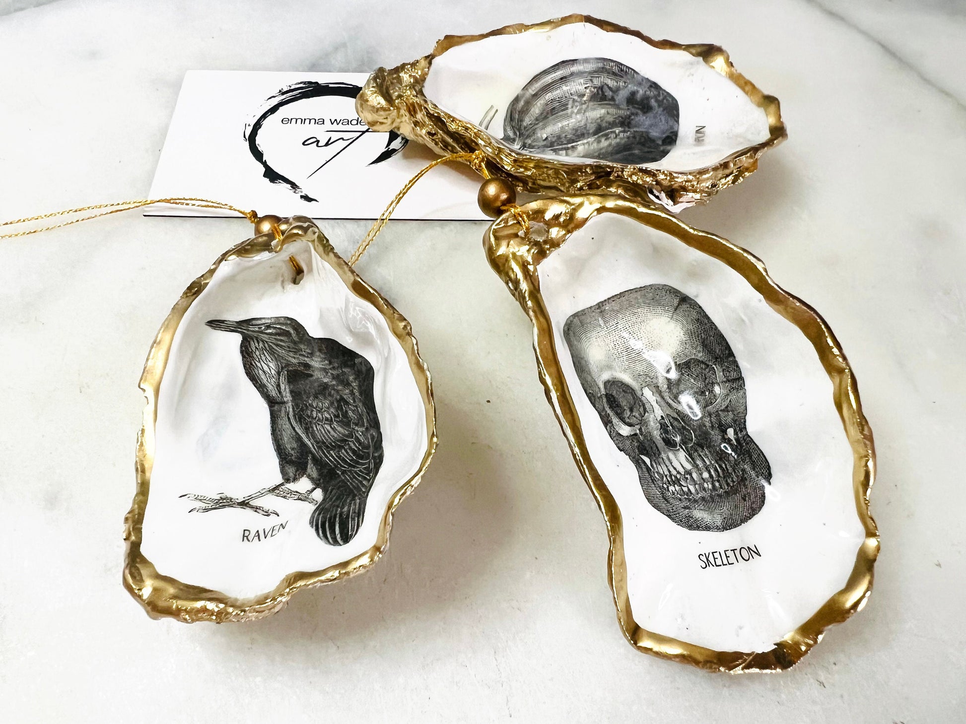 gothic ornaments, halloween oyster shell, gilded oyster hanging ornaments, coastal gothic decor, gothic christmas ornament, skull oyster shell decoration, pumpkin oyster shell ornament, raven oyster shell hanging decor, spooky oyster shell trinket dish, gothic halloween tree ornament, handmade gothic oyster shell gift, oyster shell gothic home accessory, dark gothic oyster shell decor, halloween oyster shell candy dish, gothic oyster shell jewellery holder, handmade oyster art UK