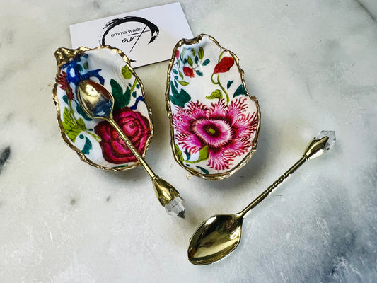 Summer pink oyster salt and pepper set, red floral oyster shell pinch pots, UK handmade shell cruet set, gold leaf oyster shell dishes, floral oyster salt pots, wedding table salt and pepper set, anniversary gift oyster shells, handmade coastal home décor, Dorset oyster shell cruet set, unique oyster shell salt gift, floral kitchen décor, oyster pinch pots with flowers, handmade oyster salt dishes, luxury shell gift idea, oyster shell tableware, optional gold crystal spoons