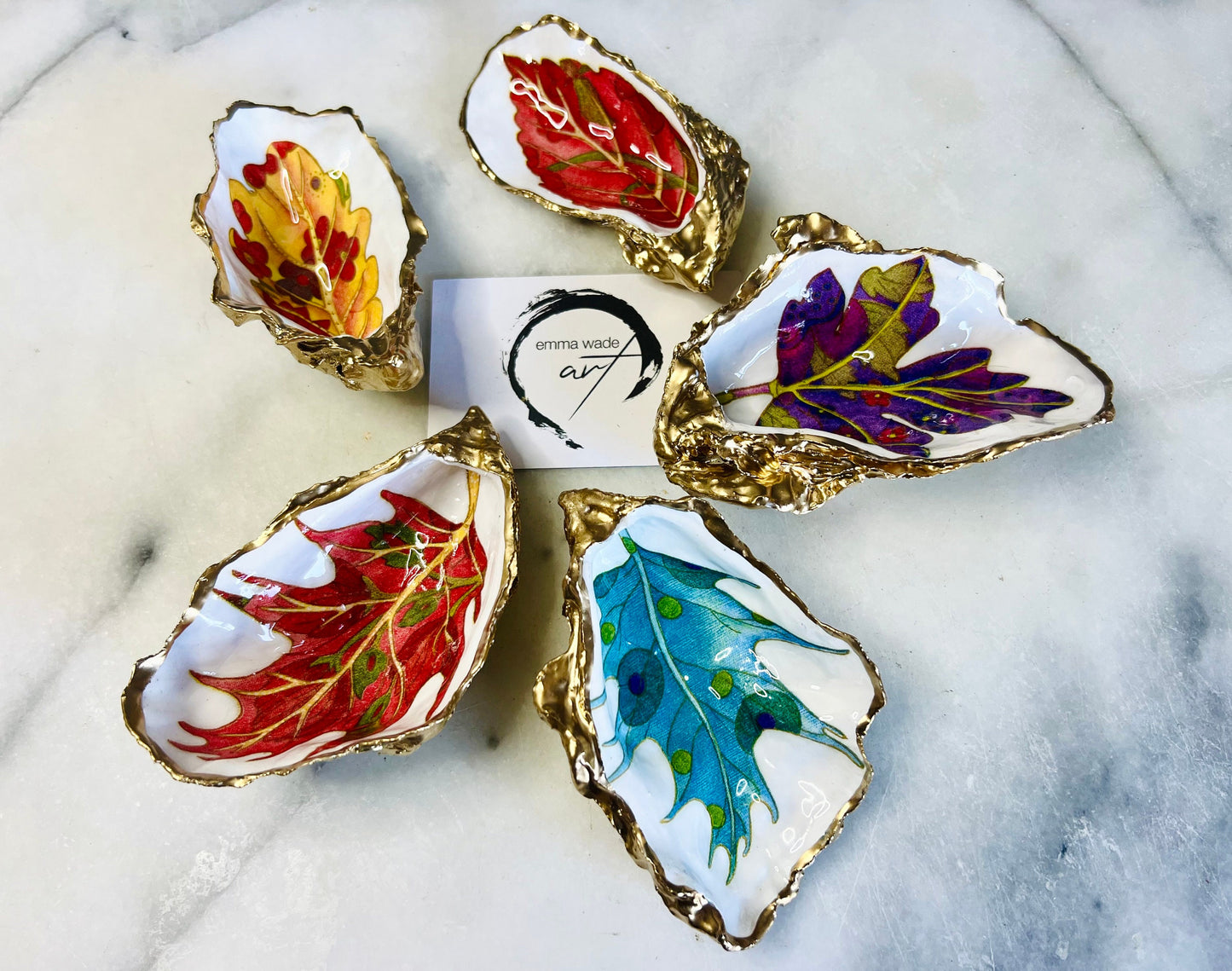jewelled leaves oyster shell dish, Dorset oyster shell jewellery holder, gold leaf gilded oyster shell trinket dish, handmade coastal oyster shell decor, eco friendly oyster shell art UK, oyster shell bathroom tray, oyster shell salt and pepper pinch pot, leaf design oyster shell ornament, red leaf oyster shell, yellow leaf oyster shell, multiple designs available oyster shell dish, unique oyster shell keepsake, sustainable oyster shell jewellery tray, handmade Dorset shell gift