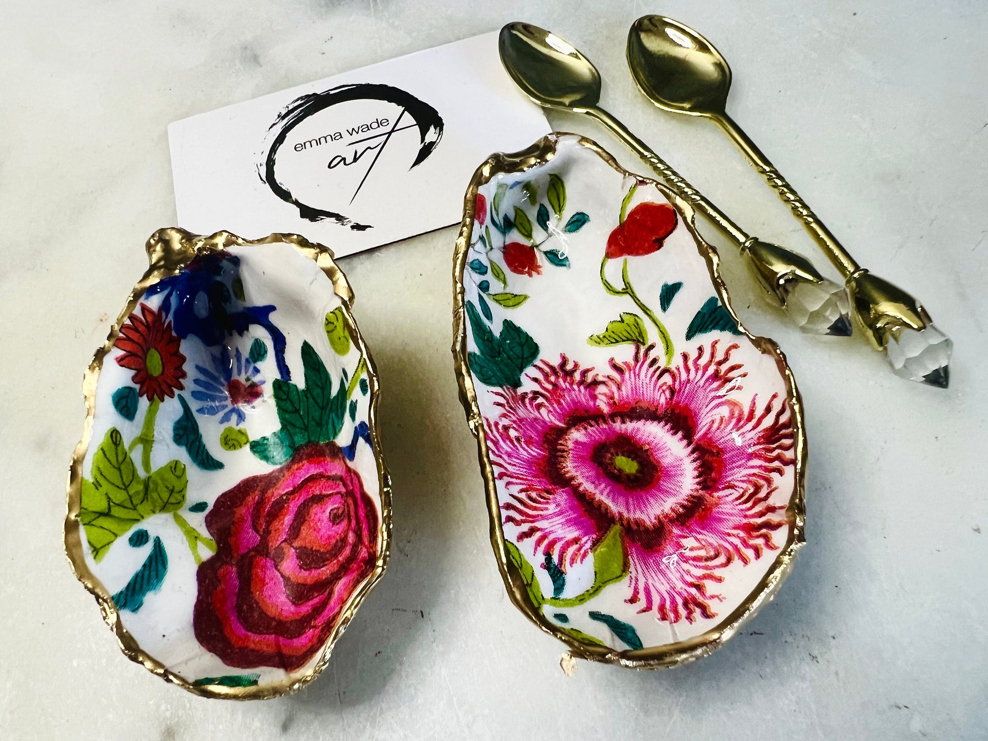 Summer pink oyster salt and pepper set, red floral oyster shell pinch pots, UK handmade shell cruet set, gold leaf oyster shell dishes, floral oyster salt pots, wedding table salt and pepper set, anniversary gift oyster shells, handmade coastal home décor, Dorset oyster shell cruet set, unique oyster shell salt gift, floral kitchen décor, oyster pinch pots with flowers, handmade oyster salt dishes, luxury shell gift idea, oyster shell tableware, optional gold crystal spoons