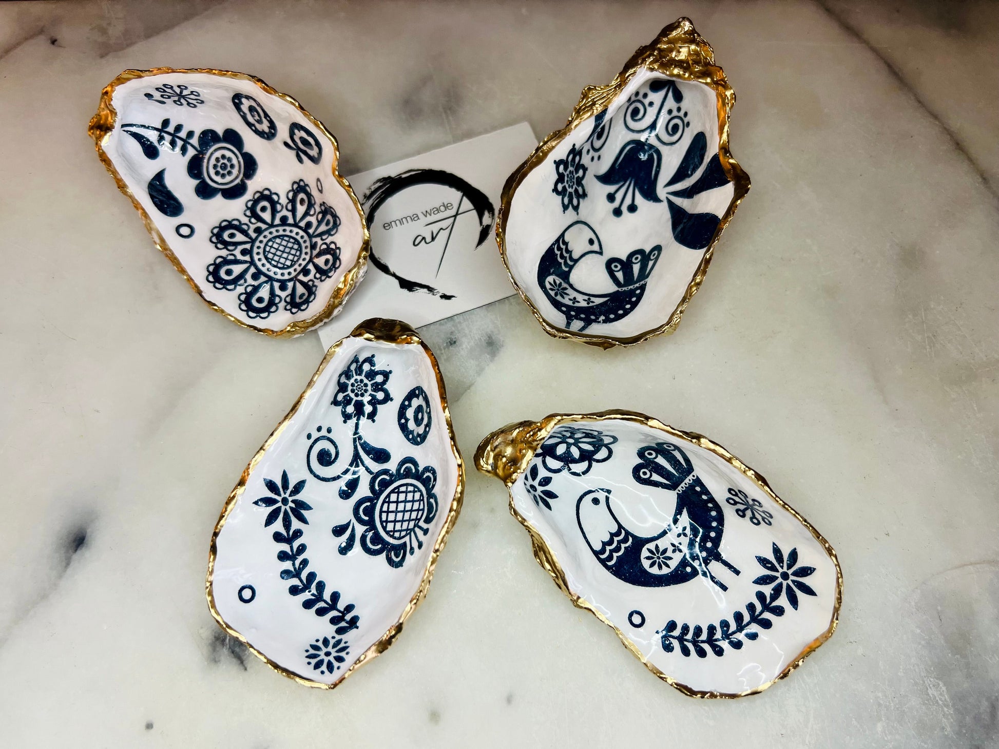 Marimekko flowers and birds oyster shell trinket dish, handmade coastal décor, Dorset shell jewellery holder, gold leaf gilded ornament, unique ocean-inspired gift, oyster shell ring dish, wedding favour, anniversary gift, handmade eco-friendly shell bowl, nautical bathroom accessory, salt and pepper pinch pot, tea light holder, sustainable oyster shell art, luxury coastal tableware, perfect gift for nature and design lovers.