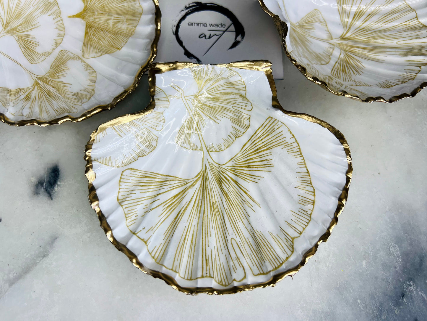 Scallop Hell Dish hand crafted with gold and white Gingko Designs, shellfish jewellery dish, UK Natural Scallop trinket tray, shell scallop dish, trinket tray shell, scallop shell jewellery bowl, golden trinket dish, decoupaged earring dish, scallop dish with gingko, decoupage shell dish, Emma Wade art, bride scallop dish, scallop shell trinket bowl, shell key bowl, gold gilded shell gift, coastal shell gift, gold white host gift, gold shell ornament, decoupage shell ring dish
