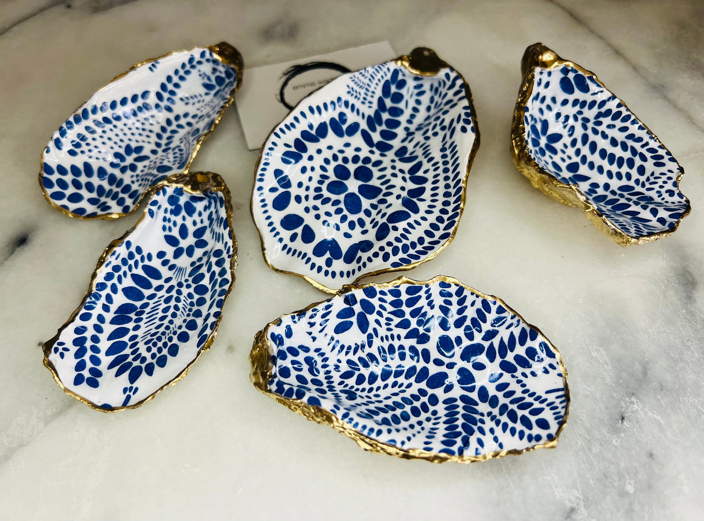 Gift for her, Gift for him, Marimekko gift, decoupaged scallop shell, Ring holder, Shell Jewellery box, Trinket dish, jewellery shell dish, Anniversary gift, gift for mum, anniversary gift, Uk Coastal shell decor, Coastal ornament, EmmaWadeART, Handmade Dorset oyster shell dish decorated with a Marimekko-inspired Finnish blue floral botanical design. Each shell is hand-finished with liquid gold leaf on the rim and back, then sealed in crystal-clear resin for a glossy, durable finish.