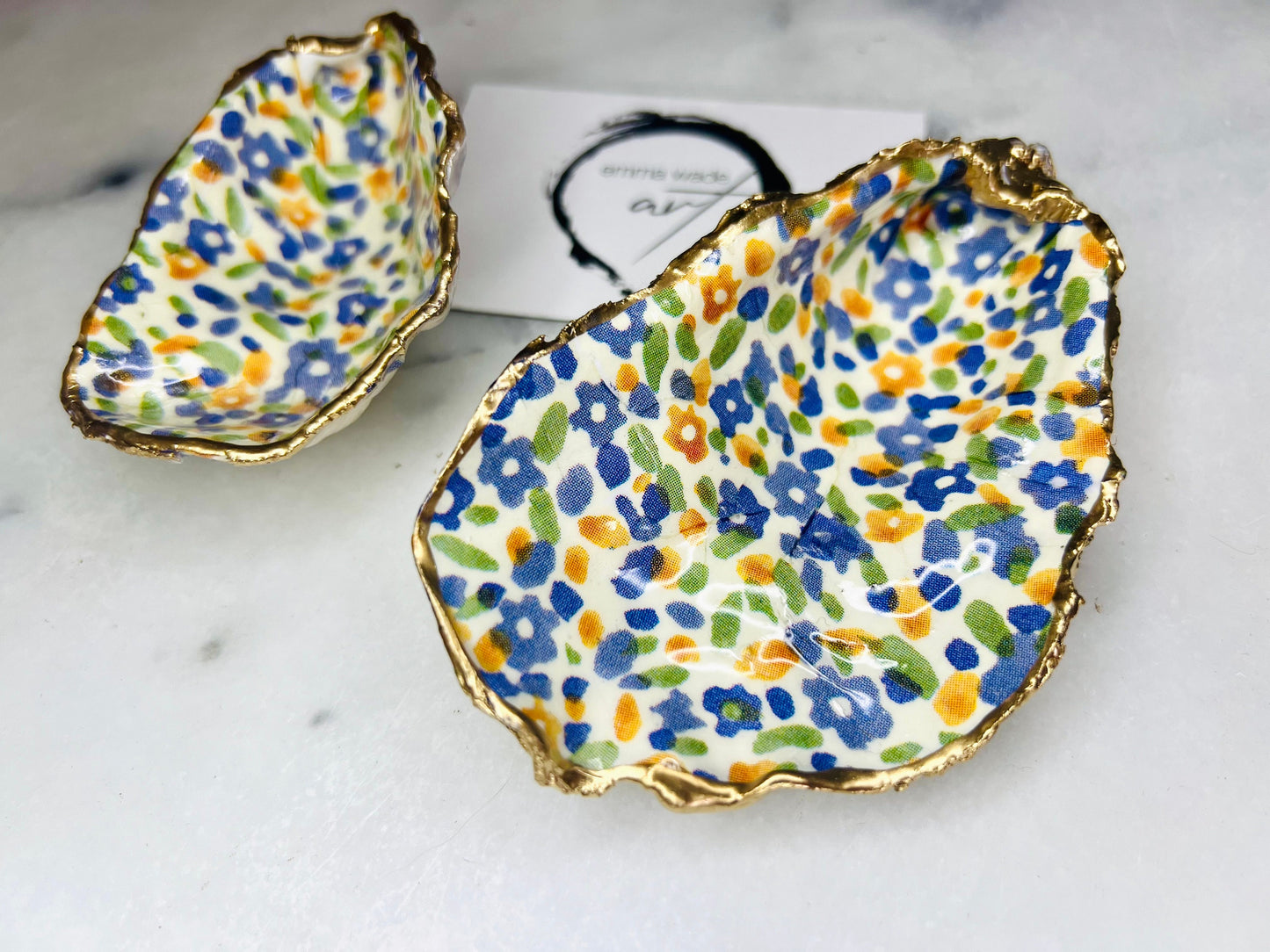 jewellery shell dish, gift for her, gift for mum, ring carrier dish, coastal decor, shell Decor, EmmaWadeART, Handmade Dorset oyster shell dish featuring Emma Bridgewater Yellow Blue Wildflower Meadow design. Finished with real gold leaf and resin. Use as a shell jewellery holder, ring dish, trinket tray, shell tray, salt pinch pot, tea light holder, or Christmas ornament. Sustainable coastal décor and unique handmade UK gift for weddings, anniversaries, or festive occasions.