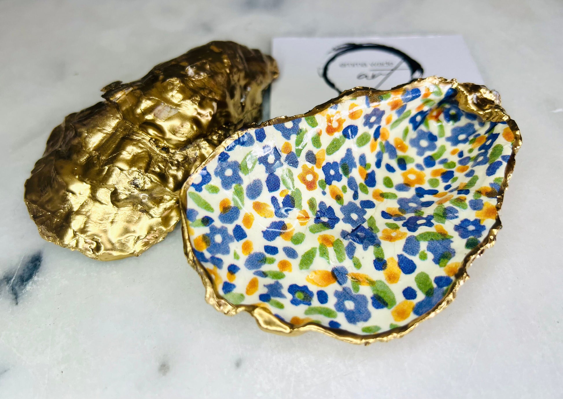 jewellery shell dish, gift for her, gift for mum, ring carrier dish, coastal decor, shell Decor, EmmaWadeART, Handmade Dorset oyster shell dish featuring Emma Bridgewater Yellow Blue Wildflower Meadow design. Finished with real gold leaf and resin. Use as a shell jewellery holder, ring dish, trinket tray, shell tray, salt pinch pot, tea light holder, or Christmas ornament. Sustainable coastal décor and unique handmade UK gift for weddings, anniversaries, or festive occasions.