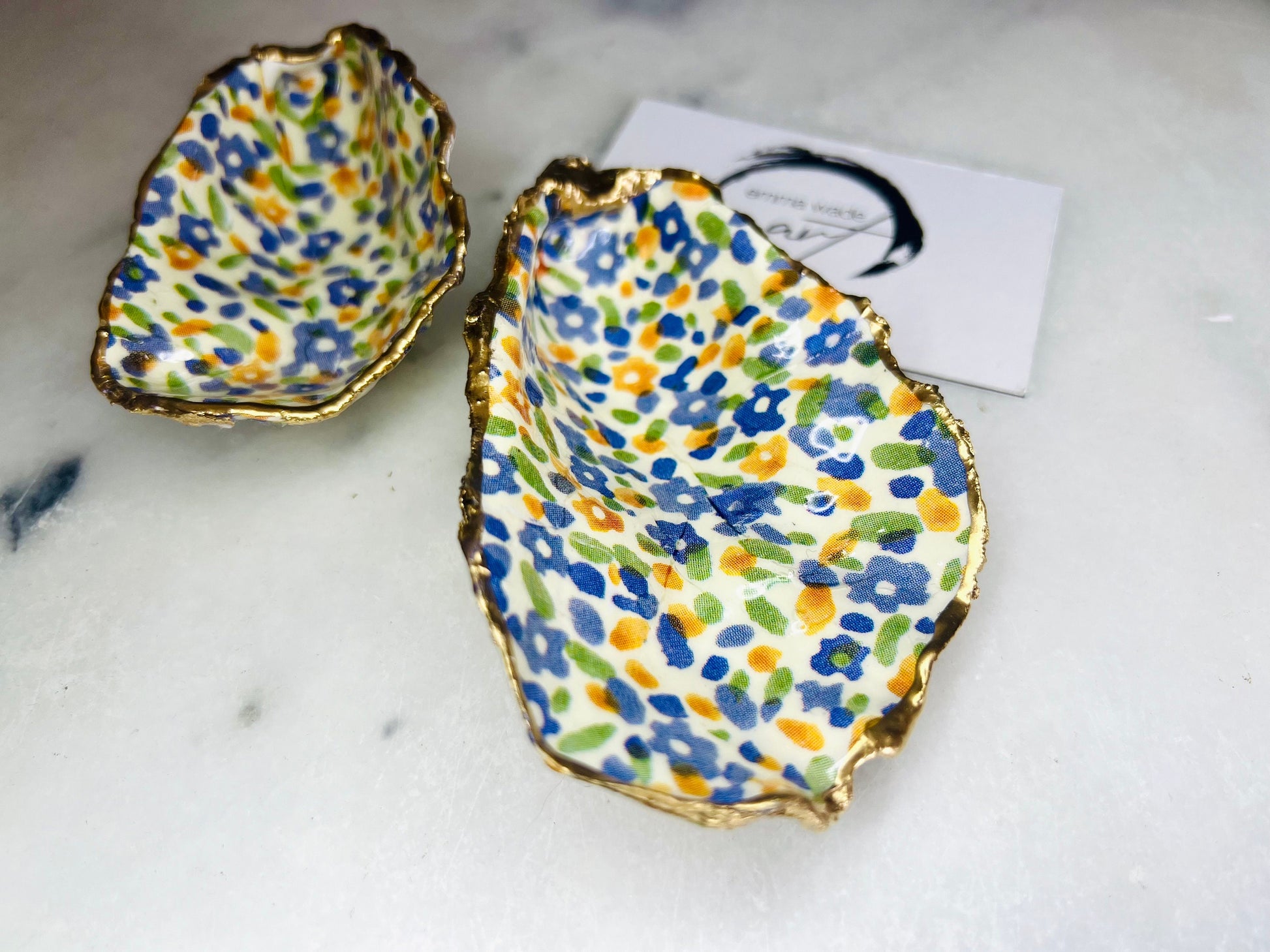 jewellery shell dish, gift for her, gift for mum, ring carrier dish, coastal decor, shell Decor, EmmaWadeART, Handmade Dorset oyster shell dish featuring Emma Bridgewater Yellow Blue Wildflower Meadow design. Finished with real gold leaf and resin. Use as a shell jewellery holder, ring dish, trinket tray, shell tray, salt pinch pot, tea light holder, or Christmas ornament. Sustainable coastal décor and unique handmade UK gift for weddings, anniversaries, or festive occasions.