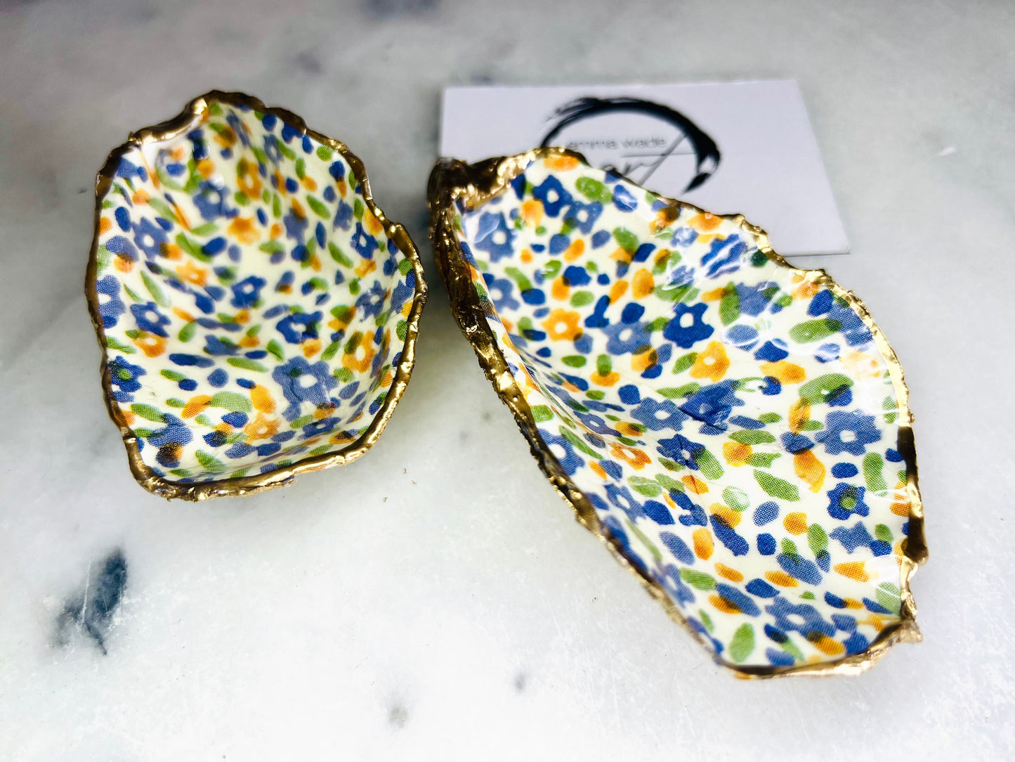 jewellery shell dish, gift for her, gift for mum, ring carrier dish, coastal decor, shell Decor, EmmaWadeART, Handmade Dorset oyster shell dish featuring Emma Bridgewater Yellow Blue Wildflower Meadow design. Finished with real gold leaf and resin. Use as a shell jewellery holder, ring dish, trinket tray, shell tray, salt pinch pot, tea light holder, or Christmas ornament. Sustainable coastal décor and unique handmade UK gift for weddings, anniversaries, or festive occasions.