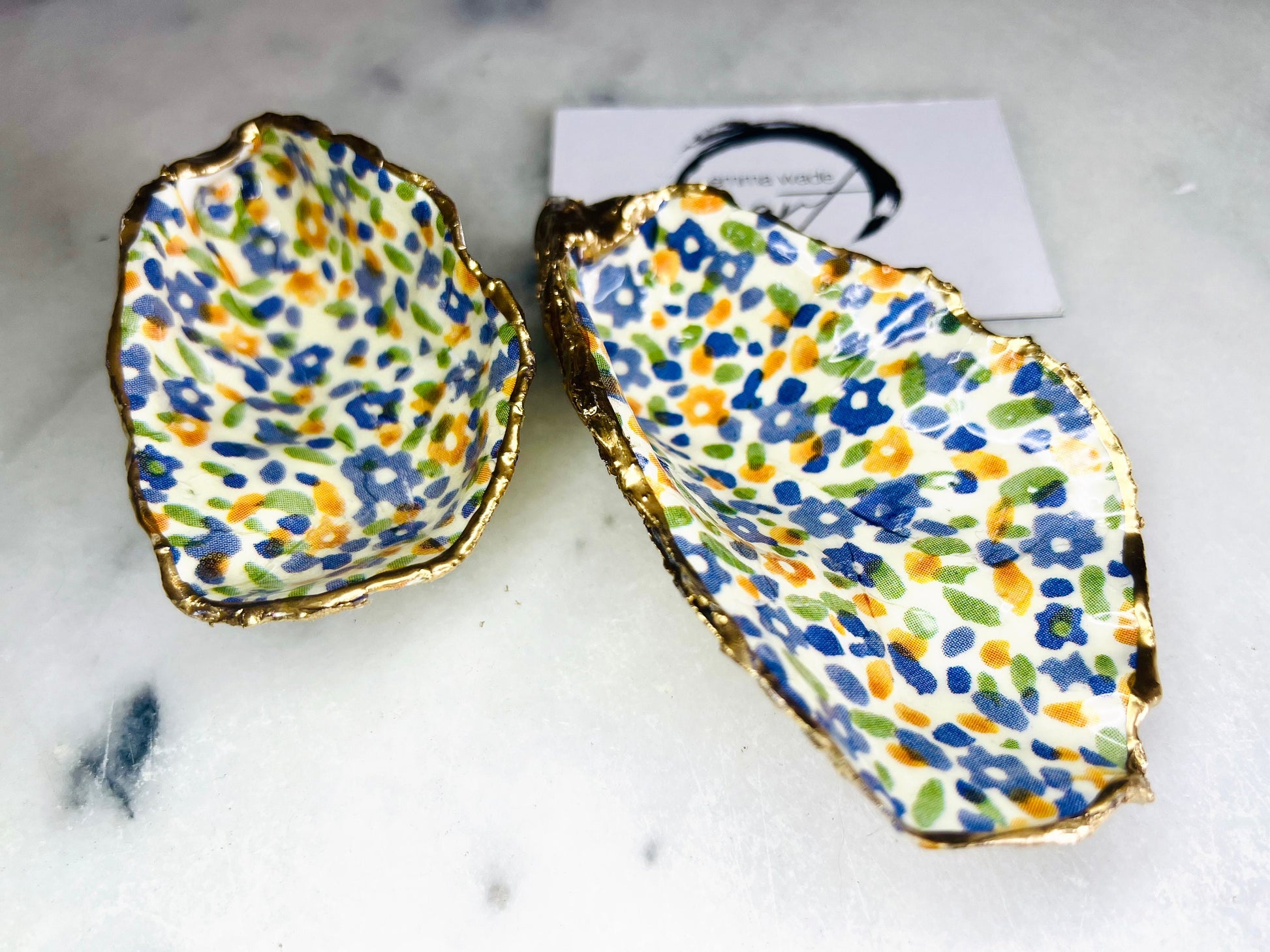 jewellery shell dish, gift for her, gift for mum, ring carrier dish, coastal decor, shell Decor, EmmaWadeART, Handmade Dorset oyster shell dish featuring Emma Bridgewater Yellow Blue Wildflower Meadow design. Finished with real gold leaf and resin. Use as a shell jewellery holder, ring dish, trinket tray, shell tray, salt pinch pot, tea light holder, or Christmas ornament. Sustainable coastal décor and unique handmade UK gift for weddings, anniversaries, or festive occasions.