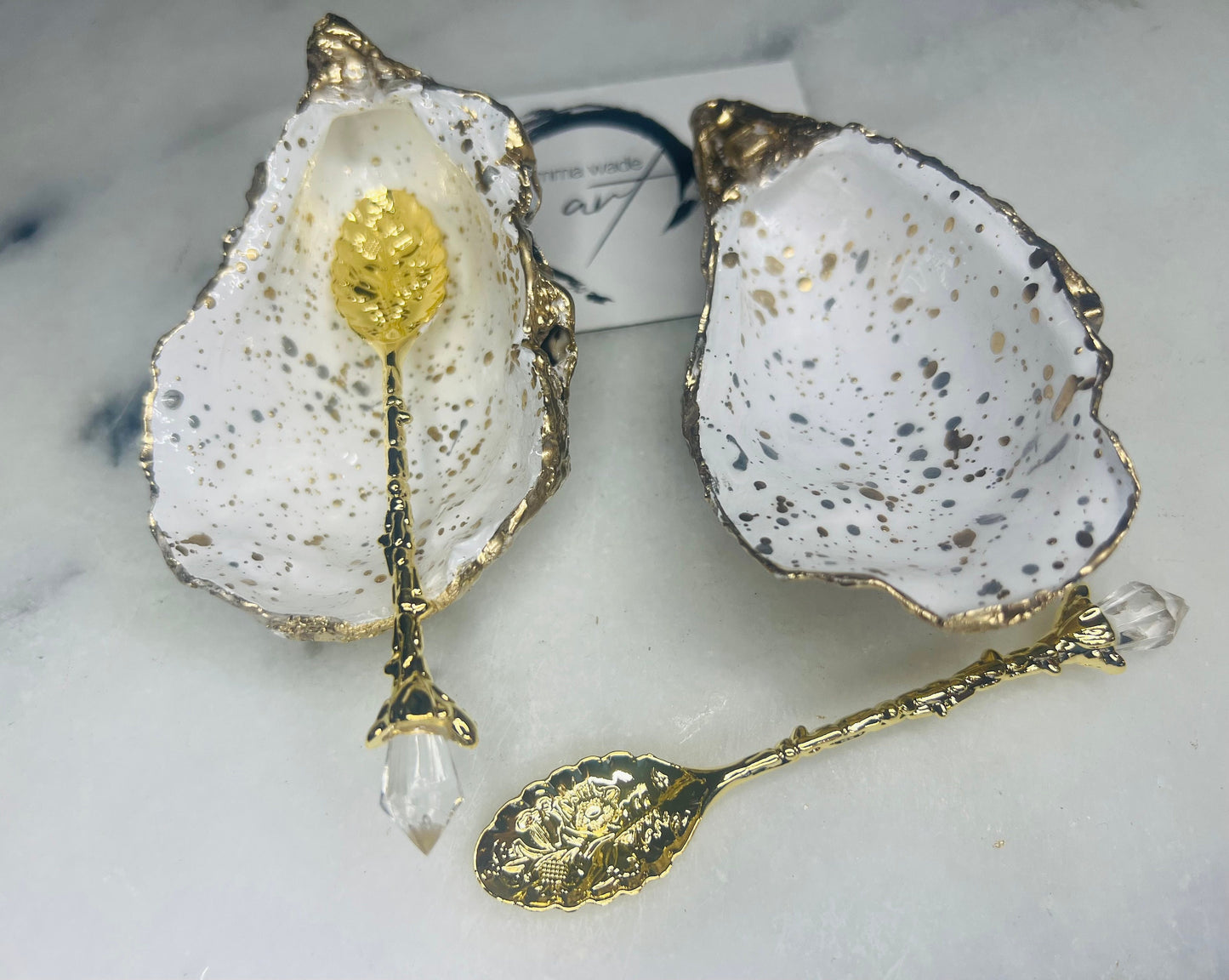 gift for her, dining decor, handmade dish, shell ornament, salt dish, salt and pepper pots, spice pots, coastal gifts, home decor, wedding favours, bridesmaid gift, pearl anniversary, shell decor, decorative accessories, EmmaWadeART, coastal decor, Handmade Dorset oyster shell salt and pepper pinch pots with glossy white interiors, speckled with liquid gold and silver leaf finish. Perfect coastal kitchen decor, beach wedding favours, or unique gift for foodies and hosts.