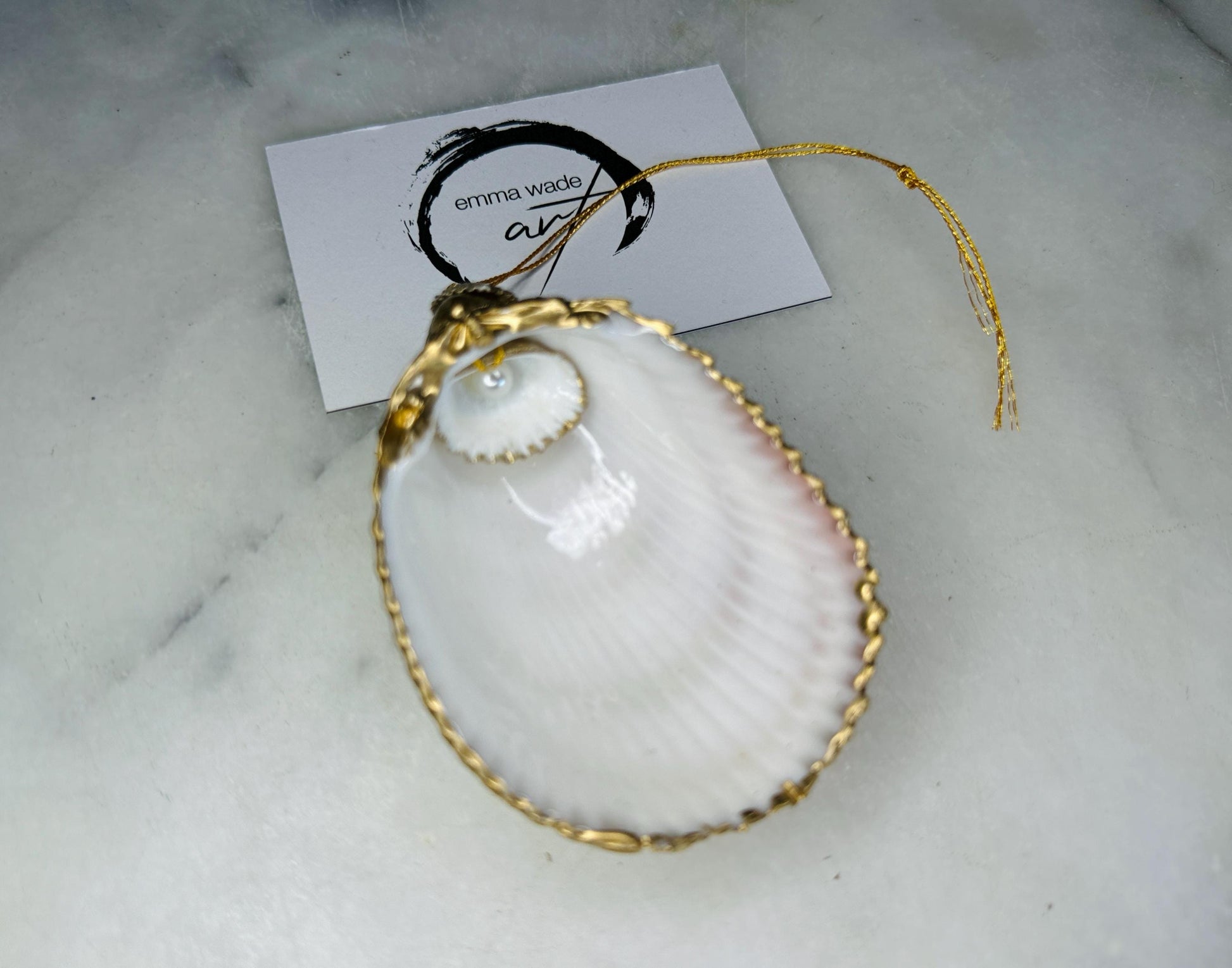 gloss finish cockle shell ornament, Swarovski pearl cockle shell decoration, gold leaf gilded shell hanging ornament, coastal Christmas tree decoration, handmade Dorset cockle shell ornament, oyster and cockle shell jewellery trinket dish, pearl anniversary shell gift, coastal home décor ornament, gilded shell Christmas bauble, handmade coastal wedding gift, UK artisan seashell decoration, sustainable seashell ornament, gold gilded cockle shell keepsake, coastal pearl ornament UK