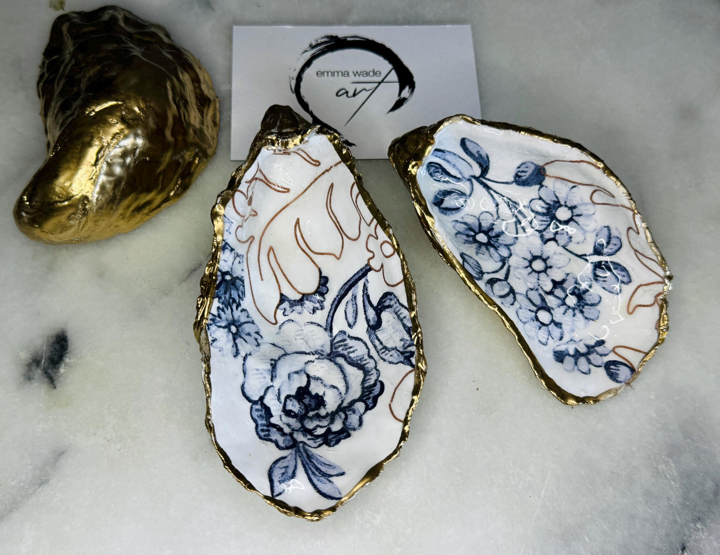 blue white Palmers print oyster shell dish, Dorset oyster shell trinket dish, gold leaf gilded oyster shell jewellery holder, handmade coastal oyster shell decor, sustainable oyster shell ornament, oyster shell bathroom tray, oyster shell salt and pepper pinch pot, oyster shell sugar dish, oyster shell spoon rest, floral oyster shell wedding gift, oyster shell Christmas present, eco friendly oyster shell art, oyster shell keepsake, unique handmade oyster shell gift UK