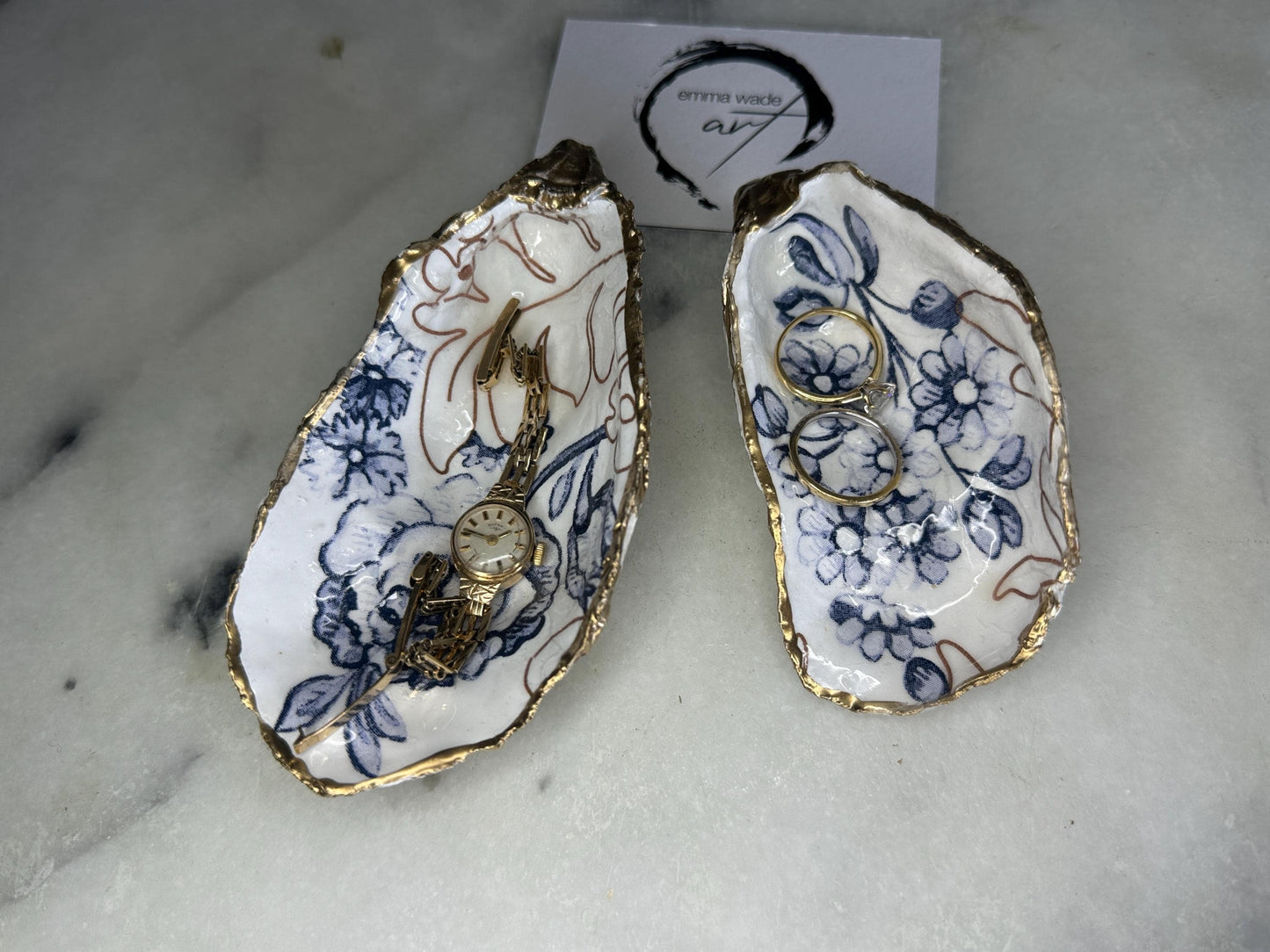 blue white Palmers print oyster shell dish, Dorset oyster shell trinket dish, gold leaf gilded oyster shell jewellery holder, handmade coastal oyster shell decor, sustainable oyster shell ornament, oyster shell bathroom tray, oyster shell salt and pepper pinch pot, oyster shell sugar dish, oyster shell spoon rest, floral oyster shell wedding gift, oyster shell Christmas present, eco friendly oyster shell art, oyster shell keepsake, unique handmade oyster shell gift UK
