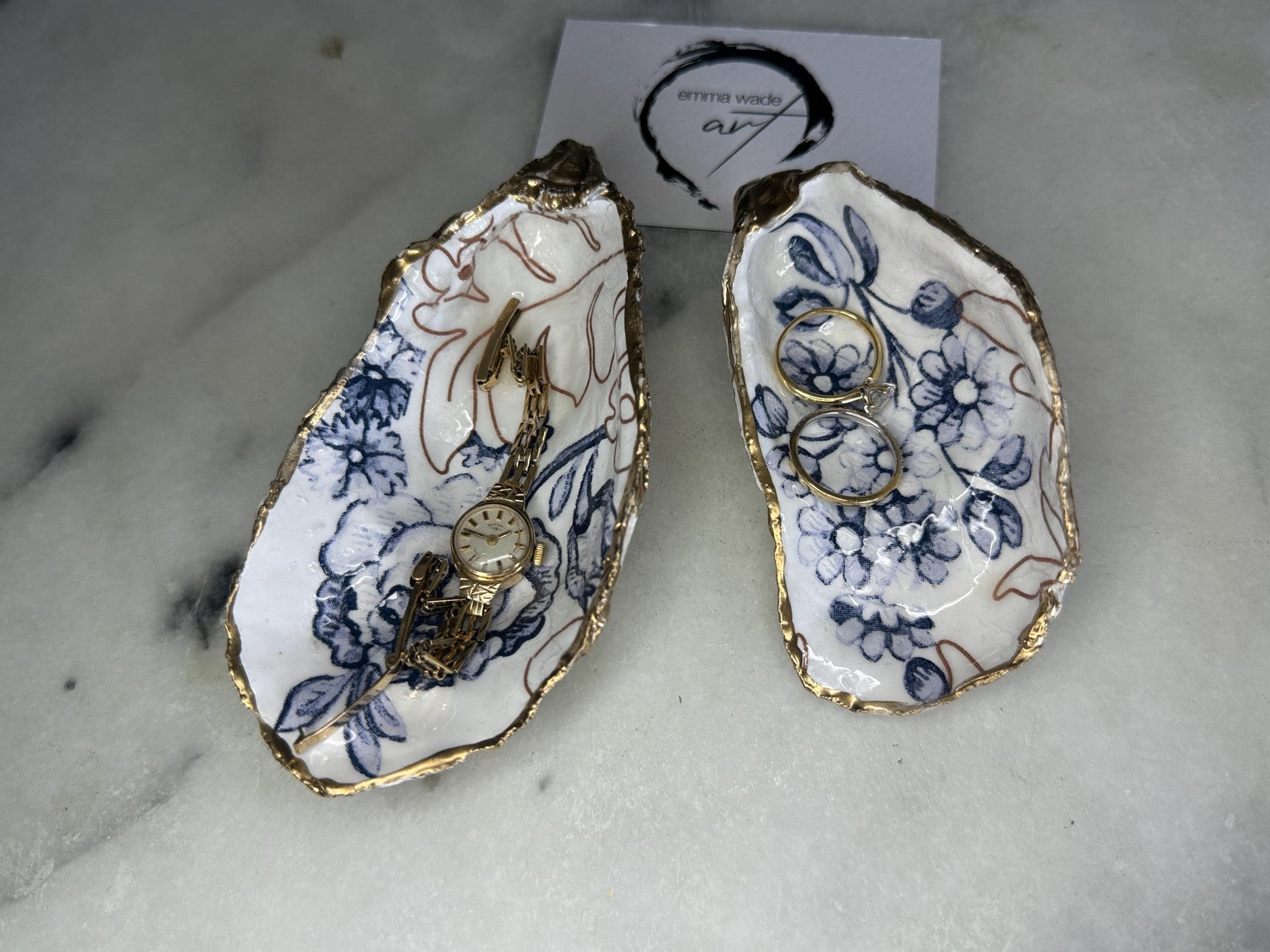 blue white Palmers print oyster shell dish, Dorset oyster shell trinket dish, gold leaf gilded oyster shell jewellery holder, handmade coastal oyster shell decor, sustainable oyster shell ornament, oyster shell bathroom tray, oyster shell salt and pepper pinch pot, oyster shell sugar dish, oyster shell spoon rest, floral oyster shell wedding gift, oyster shell Christmas present, eco friendly oyster shell art, oyster shell keepsake, unique handmade oyster shell gift UK