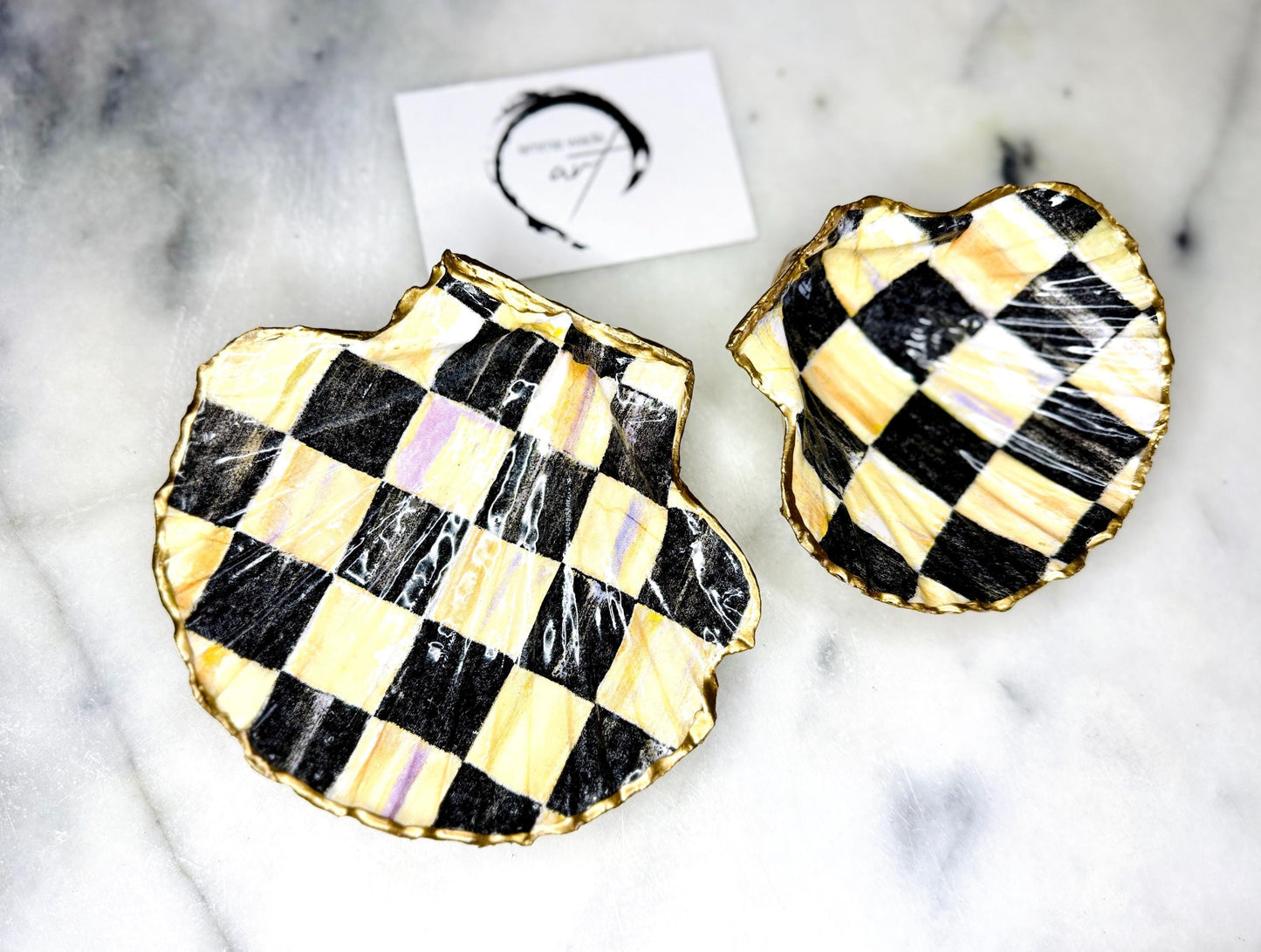 black and gold chequers scallop shell dish, handmade Dorset scallop shell trinket dish, gold leaf gilded jewellery holder, unique scallop shell ornament, black and gold coastal home decor, artisan scallop shell jewellery tray, scallop shell salt and pepper pinch pot, sustainable Dorset scallop shell gift, handmade scallop shell vanity dish UK, gothic scallop shell ornament gift, coastal inspired handmade shell decor, unique black and gold scallop shell keepsake, artisan shell jewellery dish UK