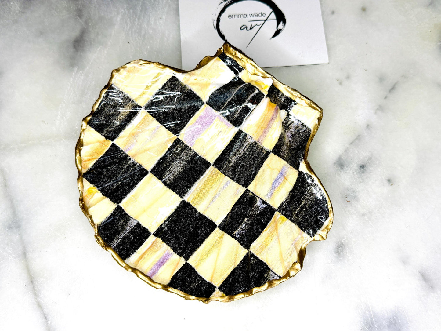 black and gold chequers scallop shell dish, handmade Dorset scallop shell trinket dish, gold leaf gilded jewellery holder, unique scallop shell ornament, black and gold coastal home decor, artisan scallop shell jewellery tray, scallop shell salt and pepper pinch pot, sustainable Dorset scallop shell gift, handmade scallop shell vanity dish UK, gothic scallop shell ornament gift, coastal inspired handmade shell decor, unique black and gold scallop shell keepsake, artisan shell jewellery dish UK