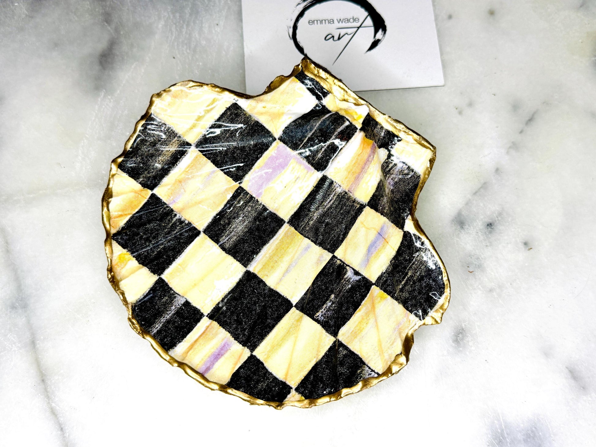 black and gold chequers scallop shell dish, handmade Dorset scallop shell trinket dish, gold leaf gilded jewellery holder, unique scallop shell ornament, black and gold coastal home decor, artisan scallop shell jewellery tray, scallop shell salt and pepper pinch pot, sustainable Dorset scallop shell gift, handmade scallop shell vanity dish UK, gothic scallop shell ornament gift, coastal inspired handmade shell decor, unique black and gold scallop shell keepsake, artisan shell jewellery dish UK