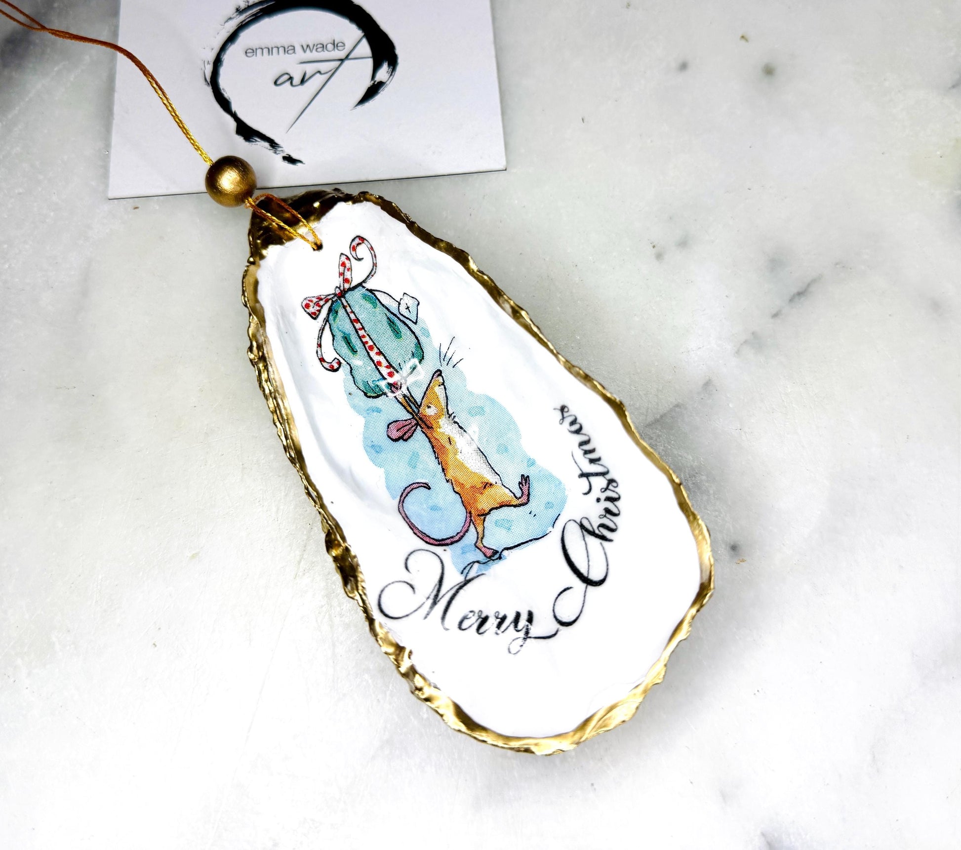 Handmade Christmas mouse oyster shell ornament. Dorset oyster shell trinket dish gilded with real gold leaf and sealed with resin. Use as festive candy dish, jewellery holder, or hanging Christmas tree ornament. Unique eco-friendly oyster shell gift, stocking filler, or table decoration. Coastal holiday décor, perfect handmade UK Christmas present, anniversary or winter wedding favour, individually crafted from natural Dorset shells.