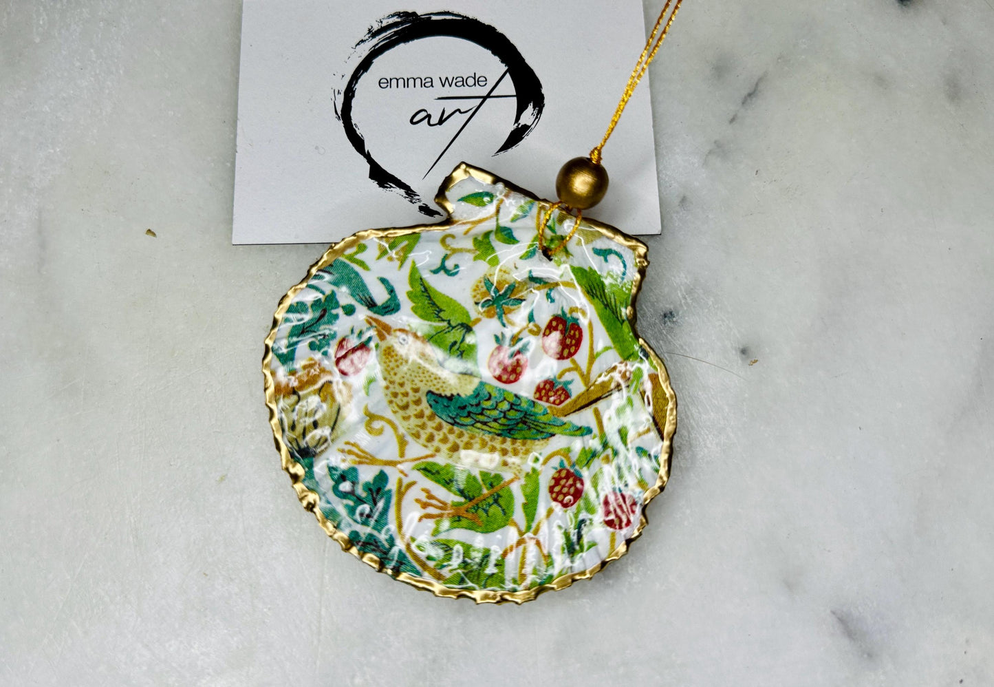 William Morris Strawberry Thief scallop shell ornaments, handmade Dorset scallop shell hanging decorations, gold leaf gilded flat shell ornaments, coastal Christmas tree decorations, Strawberry Thief William Morris nature inspired shell art, oyster and scallop shell hanging gifts, eco friendly handmade scallop shell decor UK, unique William Morris scallop ornaments for weddings, anniversaries, or new home, handmade Dorset scallop shell ornaments with gold string and gift box packaging