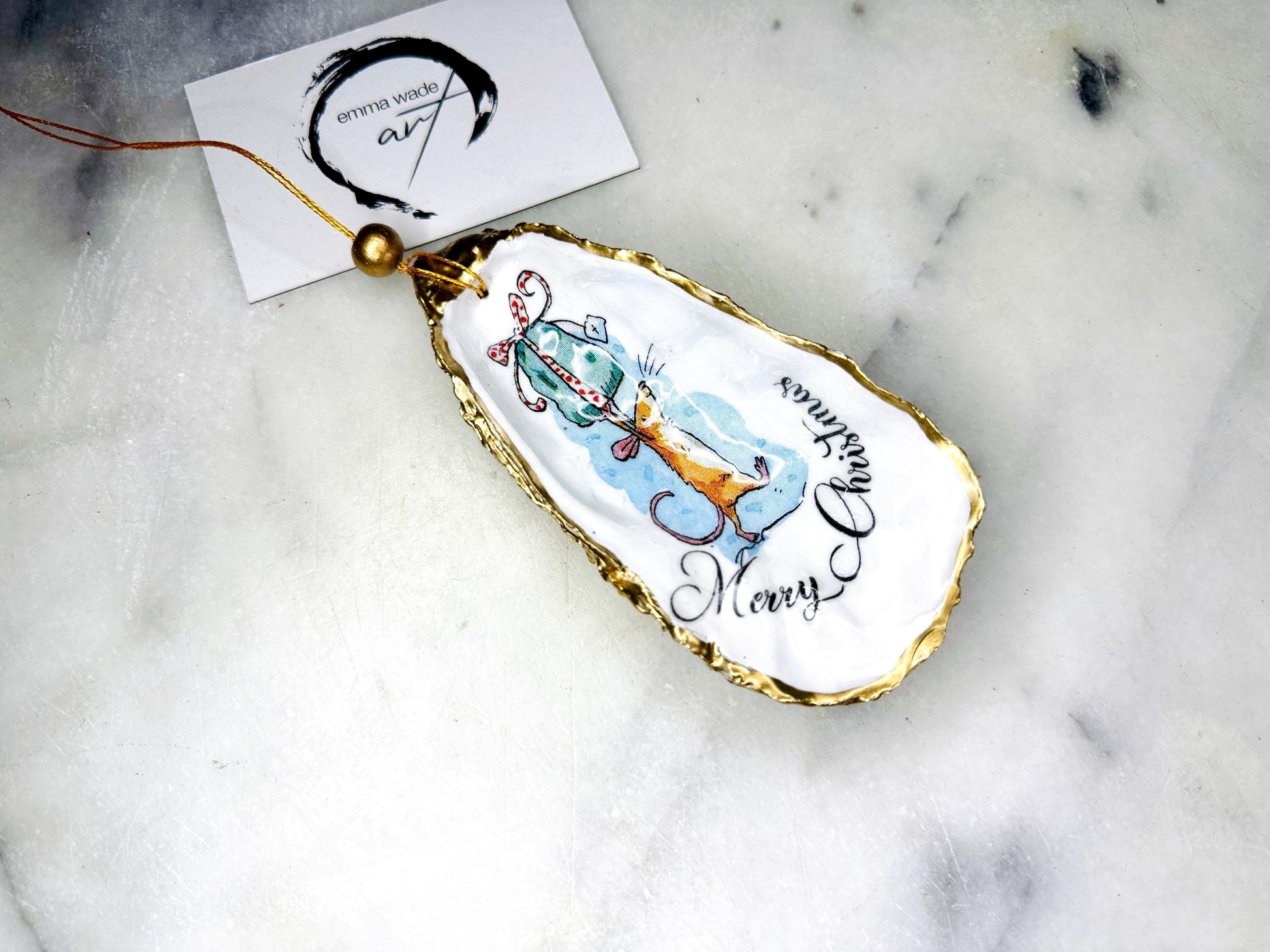 Handmade Christmas mouse oyster shell ornament. Dorset oyster shell trinket dish gilded with real gold leaf and sealed with resin. Use as festive candy dish, jewellery holder, or hanging Christmas tree ornament. Unique eco-friendly oyster shell gift, stocking filler, or table decoration. Coastal holiday décor, perfect handmade UK Christmas present, anniversary or winter wedding favour, individually crafted from natural Dorset shells.