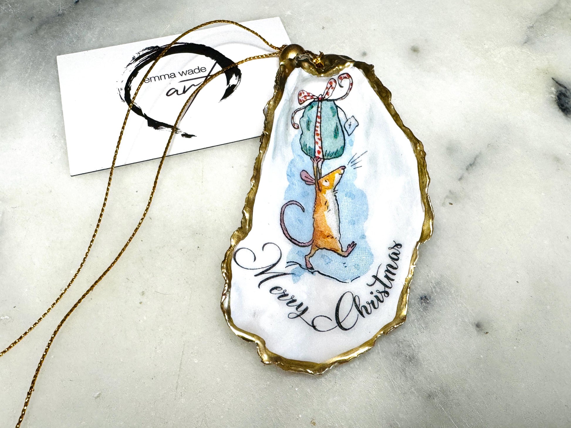 Handmade Christmas mouse oyster shell ornament. Dorset oyster shell trinket dish gilded with real gold leaf and sealed with resin. Use as festive candy dish, jewellery holder, or hanging Christmas tree ornament. Unique eco-friendly oyster shell gift, stocking filler, or table decoration. Coastal holiday décor, perfect handmade UK Christmas present, anniversary or winter wedding favour, individually crafted from natural Dorset shells.