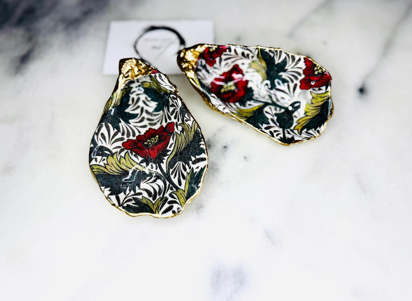 William Morris Red Peony oyster shell ring dish and jewellery dish. Handmade from natural Dorset shells with hand-painted floral design and gold leaf edges. A unique trinket tray, ring holder, or cufflink dish. Perfect for weddings, anniversaries, birthdays, bridesmaids, or new home gifts. Can also be used as a tealight holder, spoon rest, or salt pinch pot. Presented in a sustainable gift box. A beautiful handmade coastal ornament and keepsake for someone special.