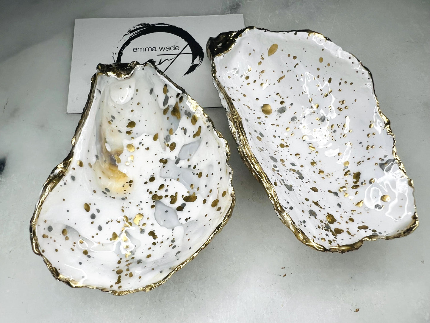 gift for her, dining decor, handmade dish, shell ornament, salt dish, salt and pepper pots, spice pots, coastal gifts, home decor, wedding favours, bridesmaid gift, pearl anniversary, shell decor, decorative accessories, EmmaWadeART, coastal decor, Handmade Dorset oyster shell salt and pepper pinch pots with glossy white interiors, speckled with liquid gold and silver leaf finish. Perfect coastal kitchen decor, beach wedding favours, or unique gift for foodies and hosts.
