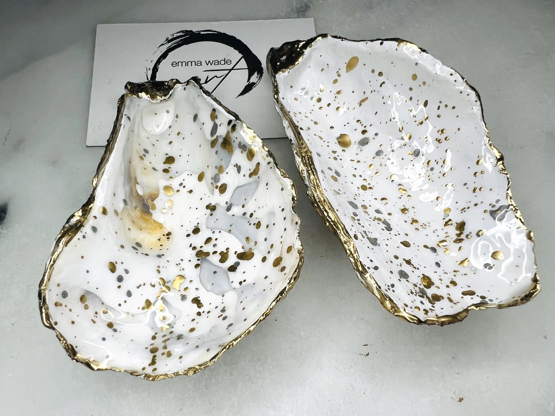 gift for her, dining decor, handmade dish, shell ornament, salt dish, salt and pepper pots, spice pots, coastal gifts, home decor, wedding favours, bridesmaid gift, pearl anniversary, shell decor, decorative accessories, EmmaWadeART, coastal decor, Handmade Dorset oyster shell salt and pepper pinch pots with glossy white interiors, speckled with liquid gold and silver leaf finish. Perfect coastal kitchen decor, beach wedding favours, or unique gift for foodies and hosts.
