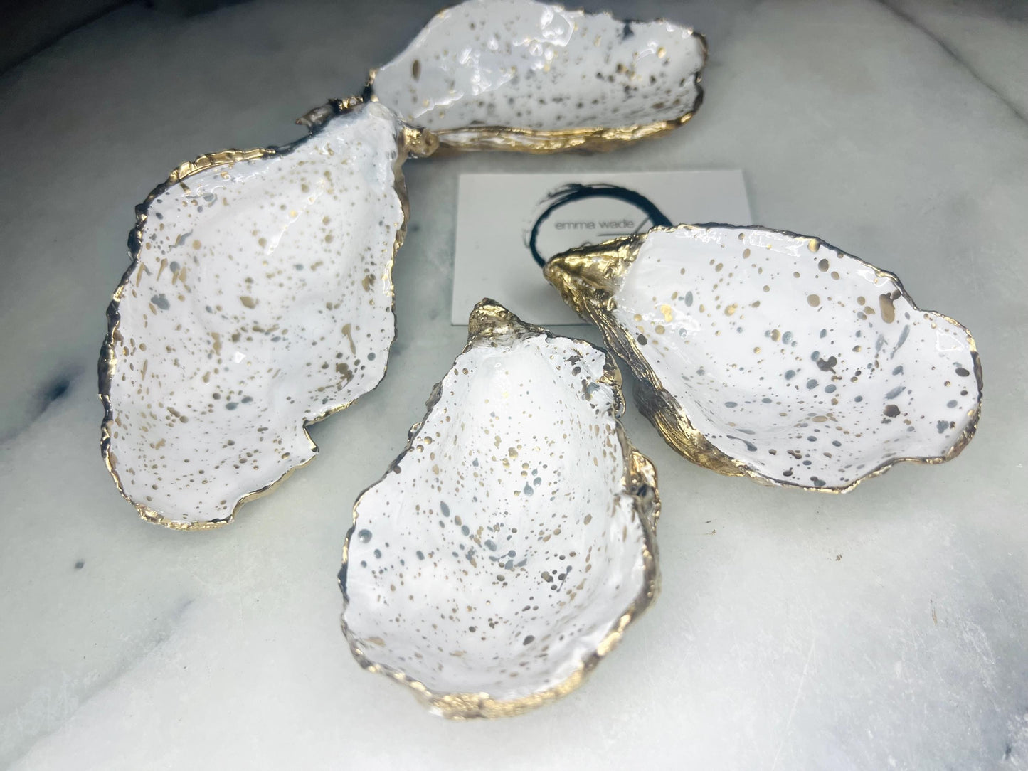 gift for her, dining decor, handmade dish, shell ornament, salt dish, salt and pepper pots, spice pots, coastal gifts, home decor, wedding favours, bridesmaid gift, pearl anniversary, shell decor, decorative accessories, EmmaWadeART, coastal decor, Handmade Dorset oyster shell salt and pepper pinch pots with glossy white interiors, speckled with liquid gold and silver leaf finish. Perfect coastal kitchen decor, beach wedding favours, or unique gift for foodies and hosts.