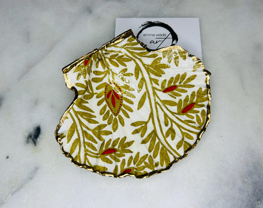 Handcrafted red and gold floral scallop shell trinket dish, gilded with liquid gold leaf and sealed in resin. Inspired by the Dorset coastline, this unique jewellery holder or trinket bowl is made from an authentic scallop shell and presented in a sustainable gift box. A thoughtful handmade coastal décor piece and ocean lover gift, ideal for weddings, birthdays, or elegant home styling.