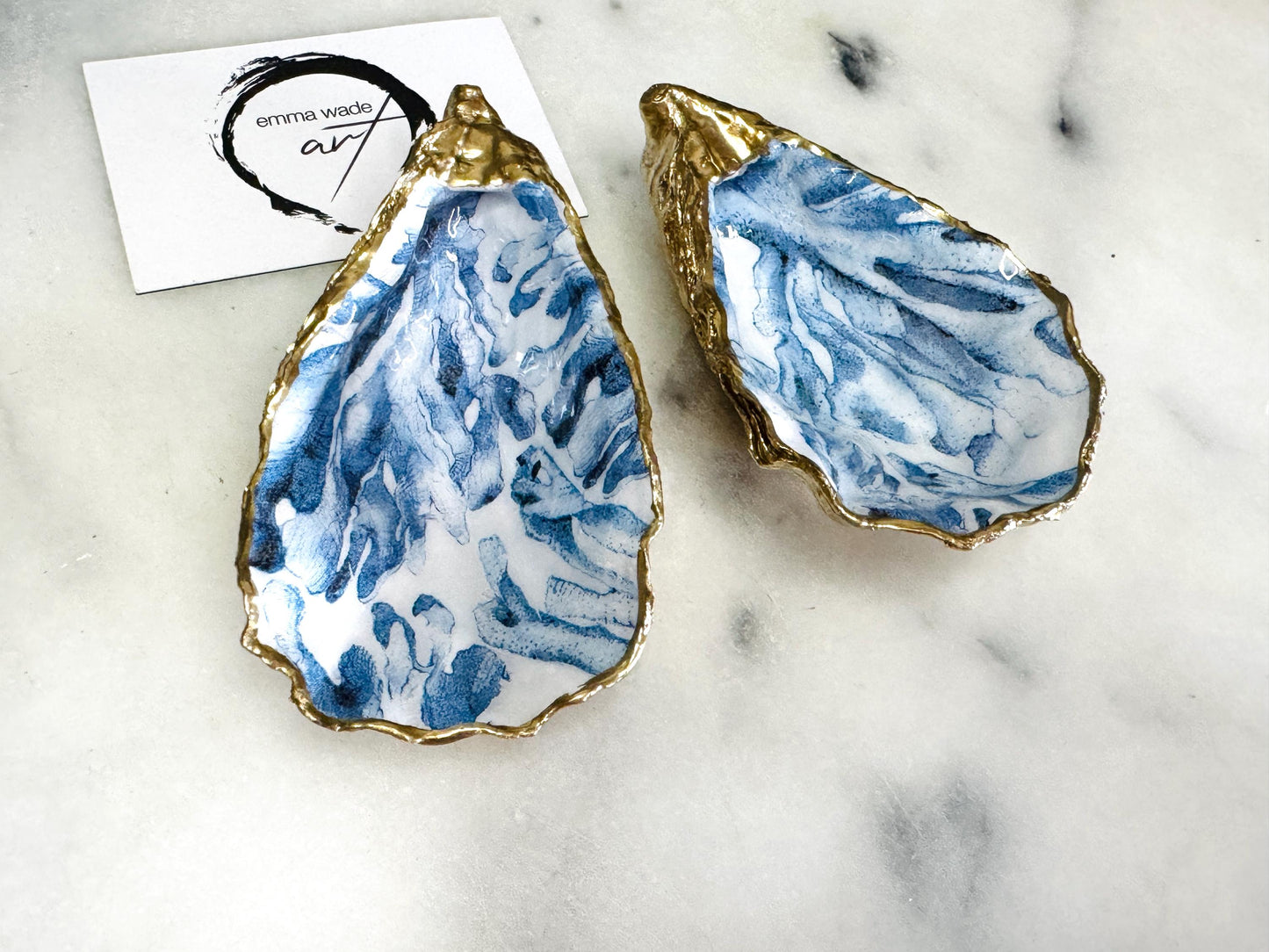Trinket dishes gold finish, shell jewellery dish, navy and gold trinket tray, shell scallop dish, trinket tray shell, she dreams of the sea, shell jewellery bowl, golden trinket dish, oyster shell blue seaweed, blue and gold dishes, decoupaged earring dish, oyster dish with coral, shell art trinket, decoupage shell dish, Emma Wade art, bride oyster dish, oyster shell trinket, shell key bowl, shell coral dish