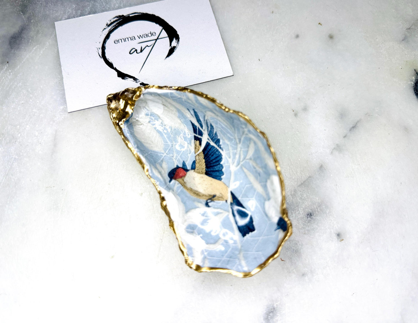blue birds oyster shell, birds of paradise shell dish, oyster trinket dish, oyster jewellery holder, coastal oyster decor, handmade ring dish, Dorset shell gift, gold leaf oyster shell, oyster shell ornament, bird design oyster dish, oyster shell tealight holder, salt and pepper oyster dish, unique coastal wedding gift, handmade oyster trinket, ocean inspired oyster dish, nautical shell home decor, eco friendly oyster shell, oyster shell bridesmaid gift, oyster jewellery storage