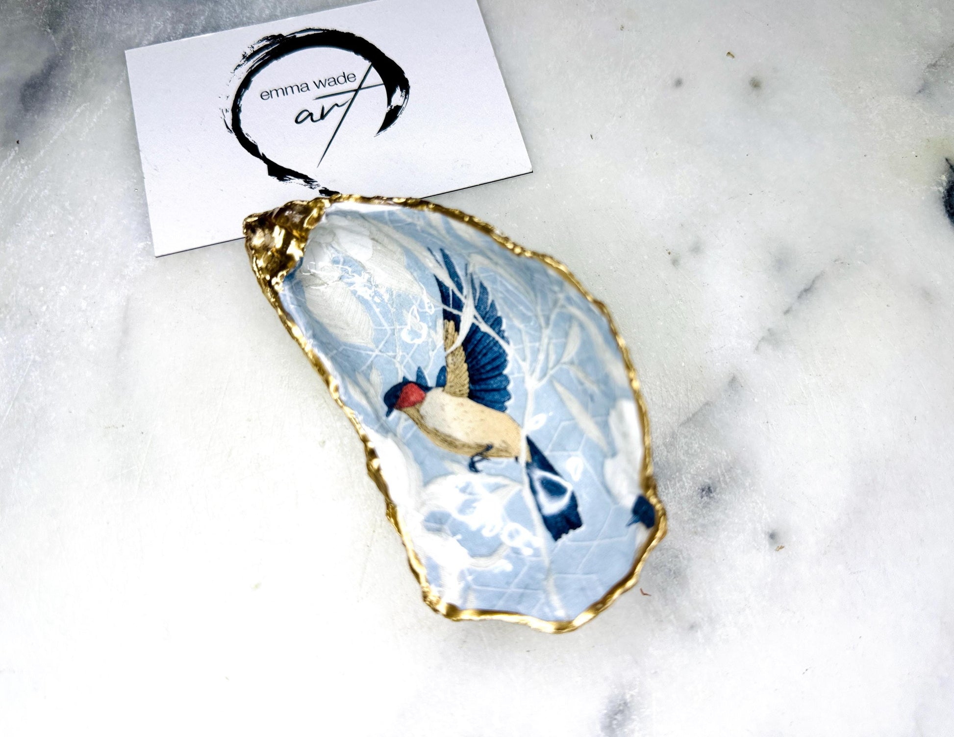 blue birds oyster shell, birds of paradise shell dish, oyster trinket dish, oyster jewellery holder, coastal oyster decor, handmade ring dish, Dorset shell gift, gold leaf oyster shell, oyster shell ornament, bird design oyster dish, oyster shell tealight holder, salt and pepper oyster dish, unique coastal wedding gift, handmade oyster trinket, ocean inspired oyster dish, nautical shell home decor, eco friendly oyster shell, oyster shell bridesmaid gift, oyster jewellery storage