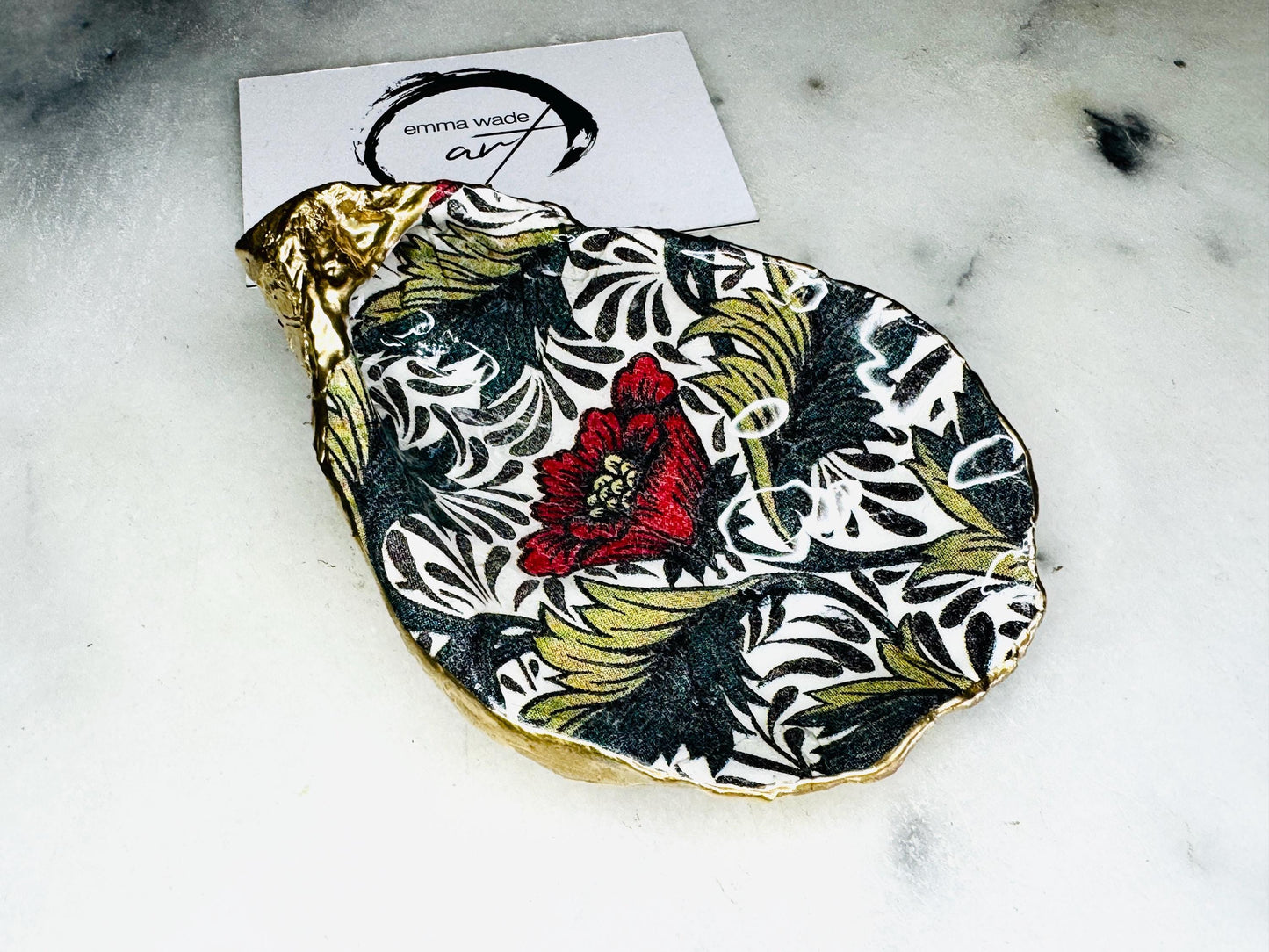 William Morris Red Peony oyster shell ring dish and jewellery dish. Handmade from natural Dorset shells with hand-painted floral design and gold leaf edges. A unique trinket tray, ring holder, or cufflink dish. Perfect for weddings, anniversaries, birthdays, bridesmaids, or new home gifts. Can also be used as a tealight holder, spoon rest, or salt pinch pot. Presented in a sustainable gift box. A beautiful handmade coastal ornament and keepsake for someone special.