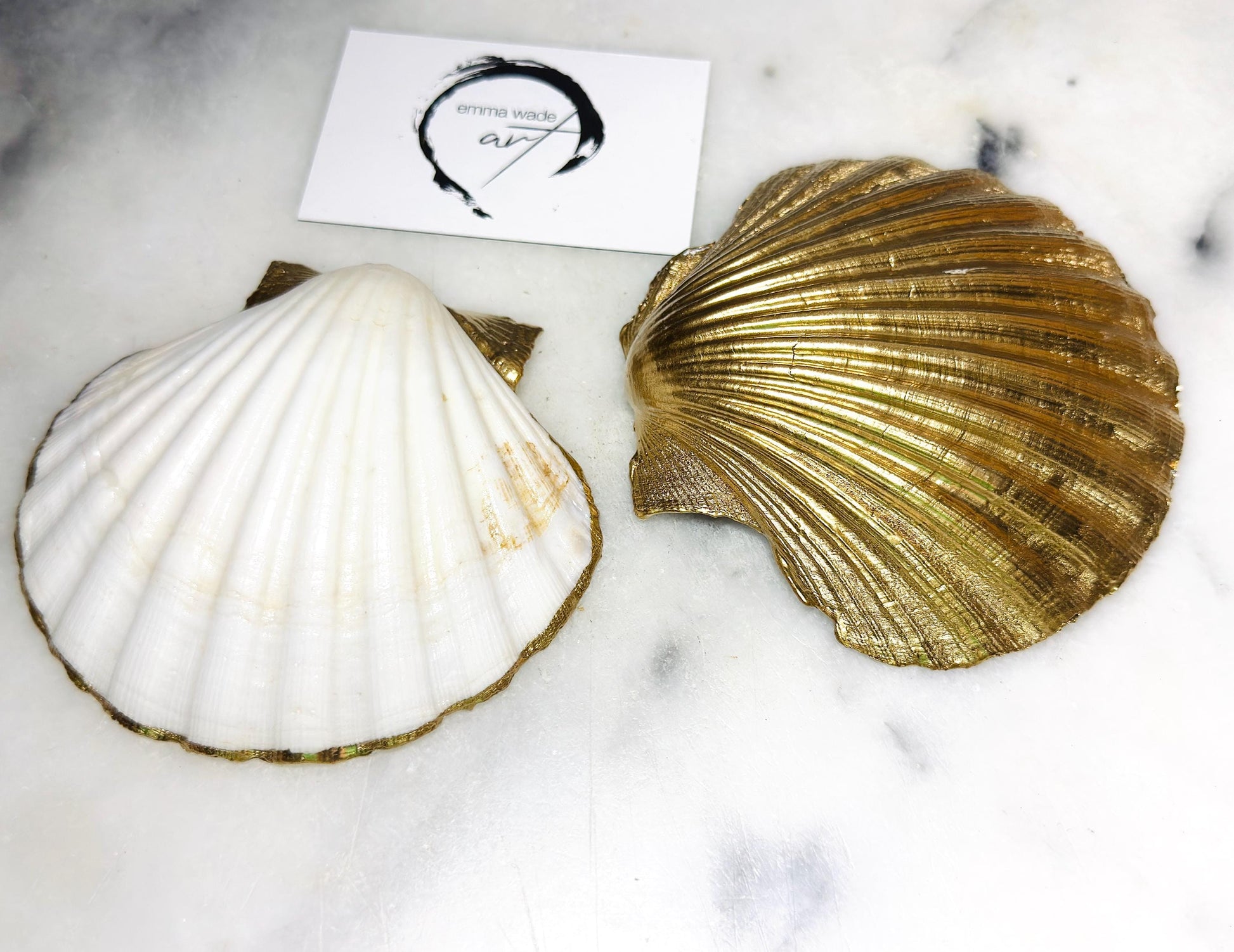 Elegant red and gold floral scallop shell trinket dish, hand-painted and gilded with liquid gold leaf before being sealed in crystal-clear resin. Each shell is a one-of-a-kind Dorset creation, perfect as a jewellery holder, tea light dish, or coastal home décor accent. A beautiful handmade ocean-inspired gift, presented in eco-friendly packaging and finished with sustainable care and artistry